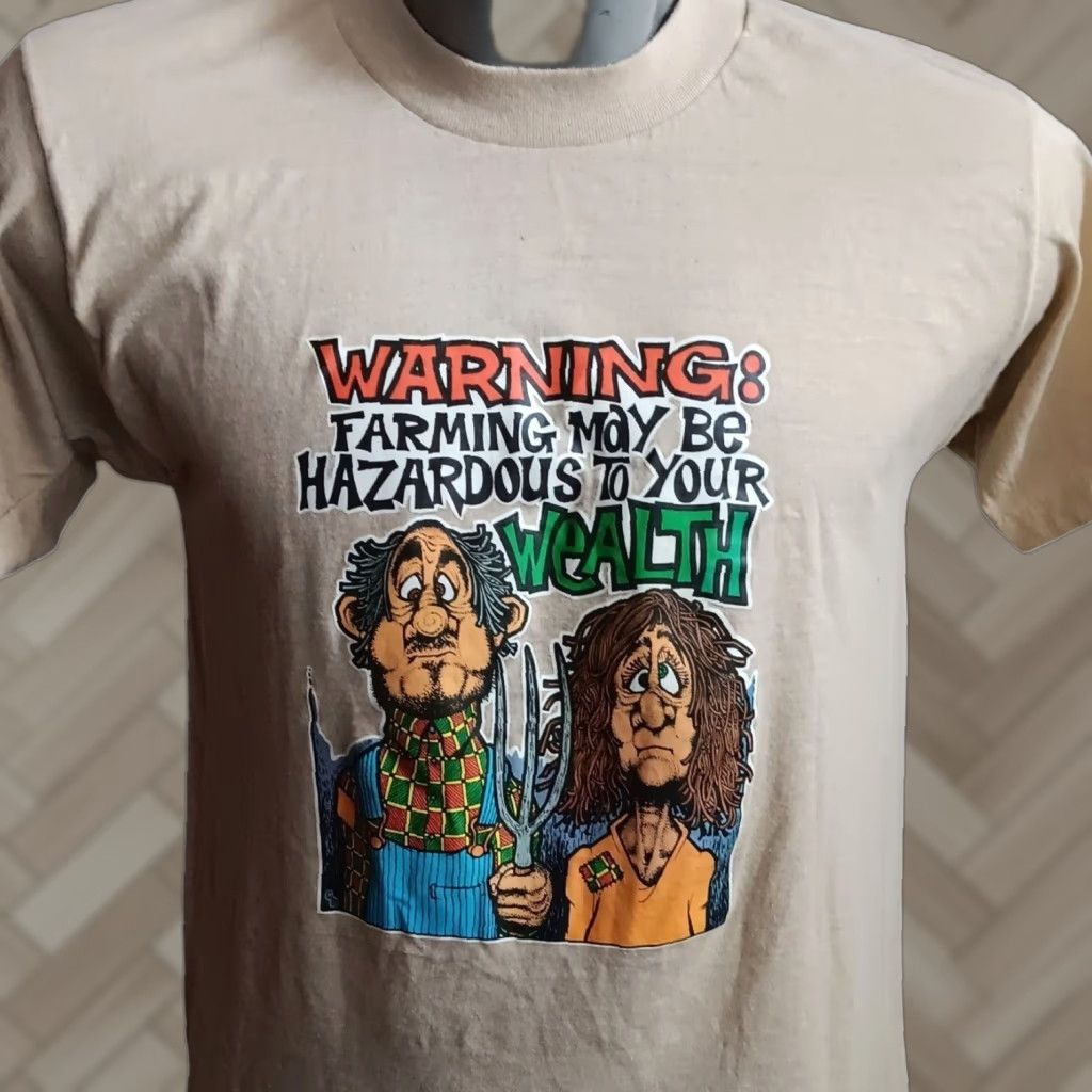 VINTAGE 1970s Farming Hazard Graphic T-Shirt Mens Medium Short Sleeve Cotton Beige Hippy Style