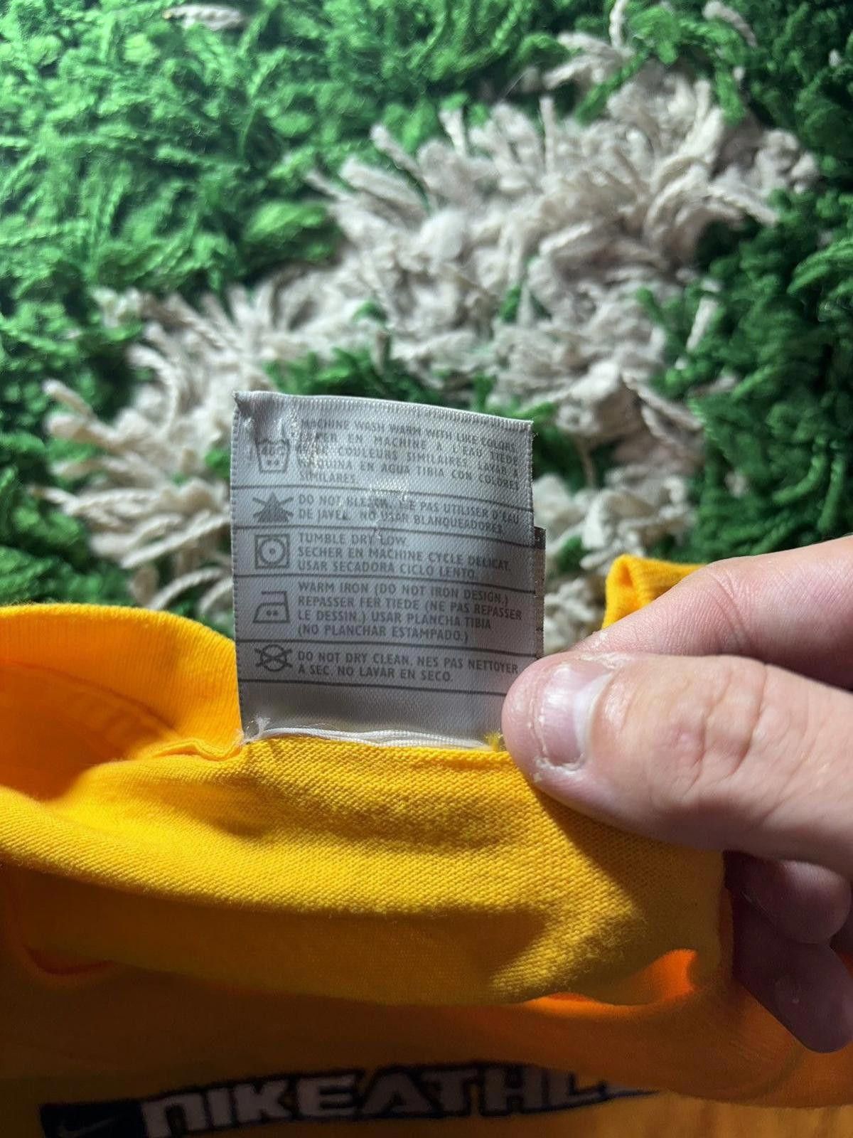 Vintage Vintage Nike Athletics Tee Size US XL / EU 56 / 4 - 5 Thumbnail