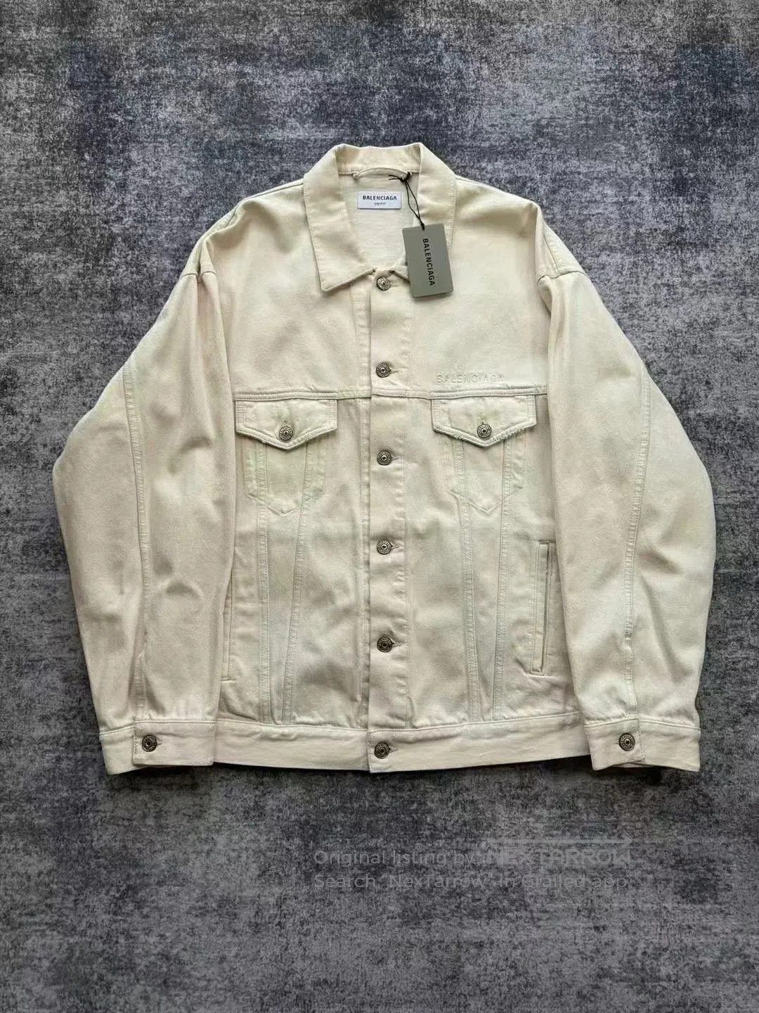 balenciaga beige distressed denim jacket.
