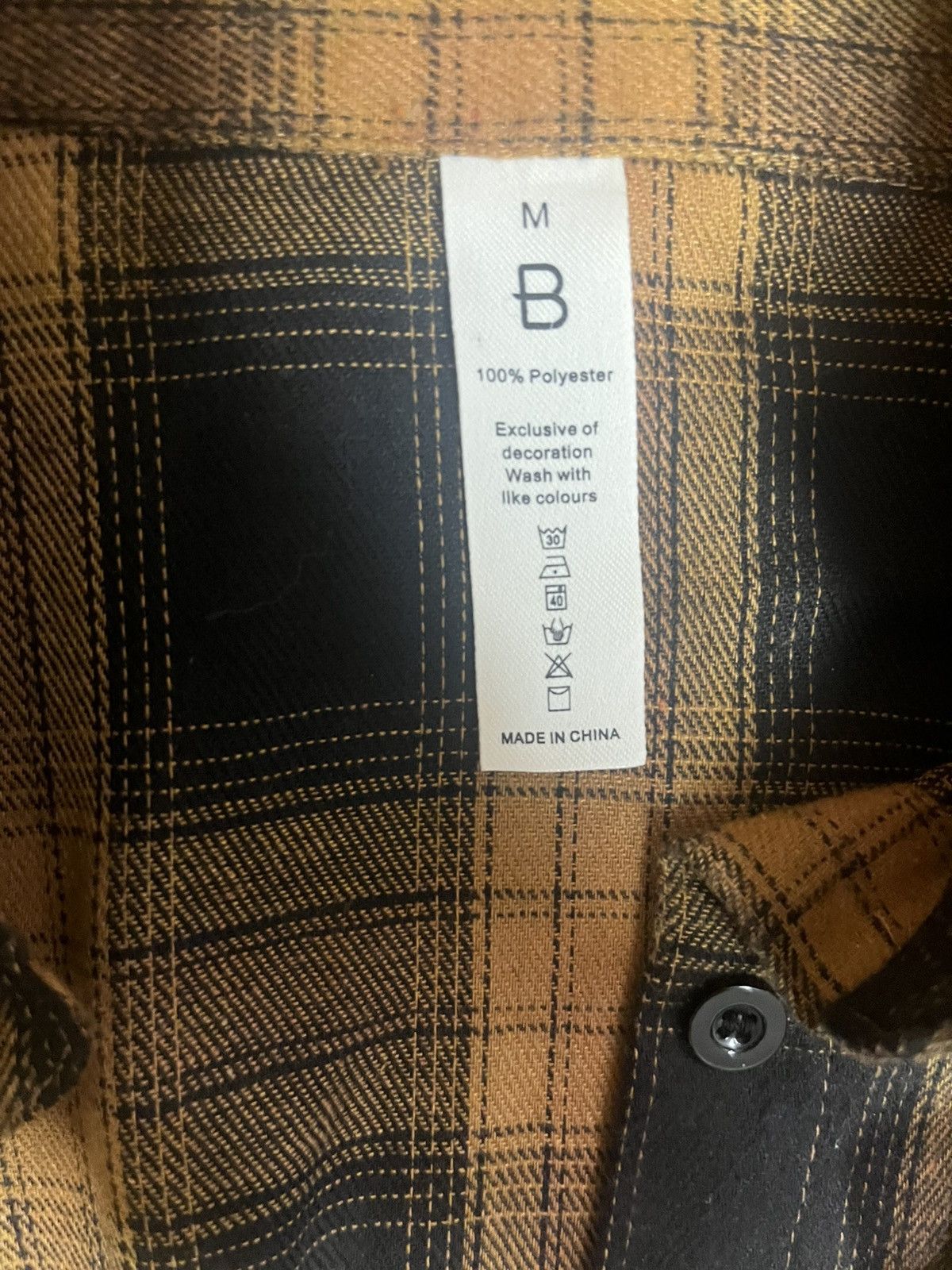 Other Brownish yellow and black flannel Size medium Size US M / EU 48-50 / 2 - 4 Thumbnail
