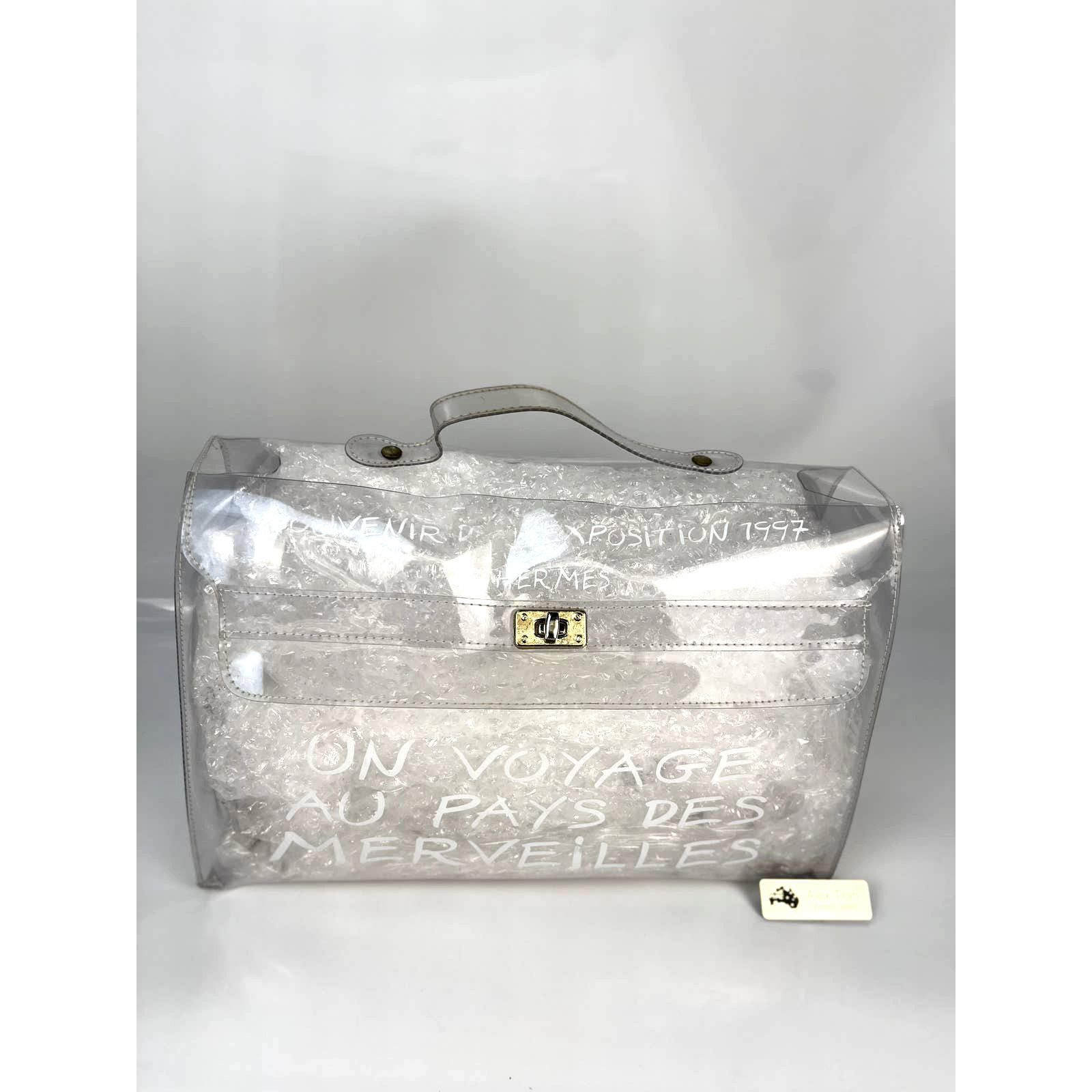 image of Hermes 1998 Vinyl Kelly Voyage Clear Handbag in White, Women's