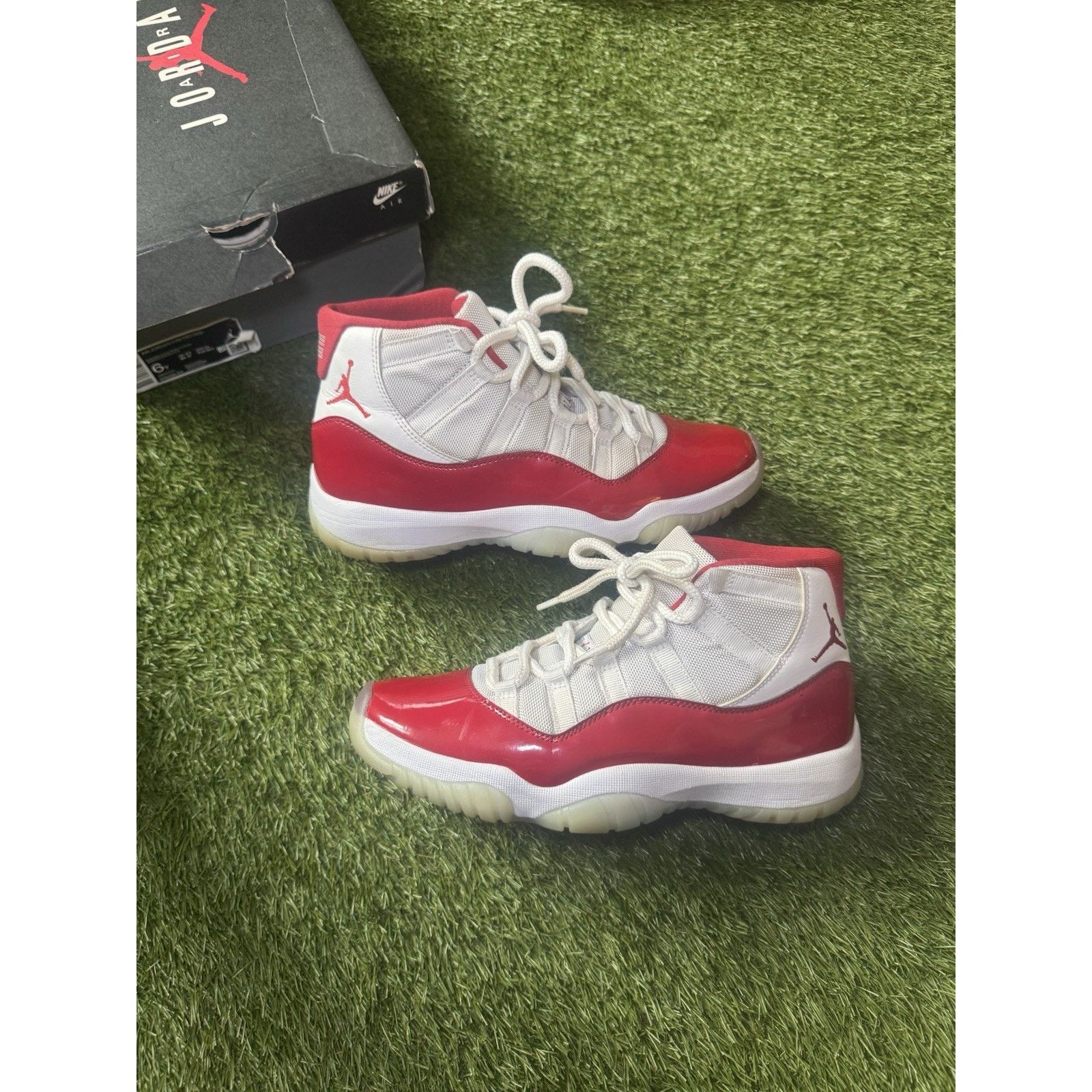 Jordan Brand Jordan Air Jordan 11 Cherry Red Men’s Mid-Top Sneaker Size US 8.5 / EU 41-42 - 1 Thumbnail