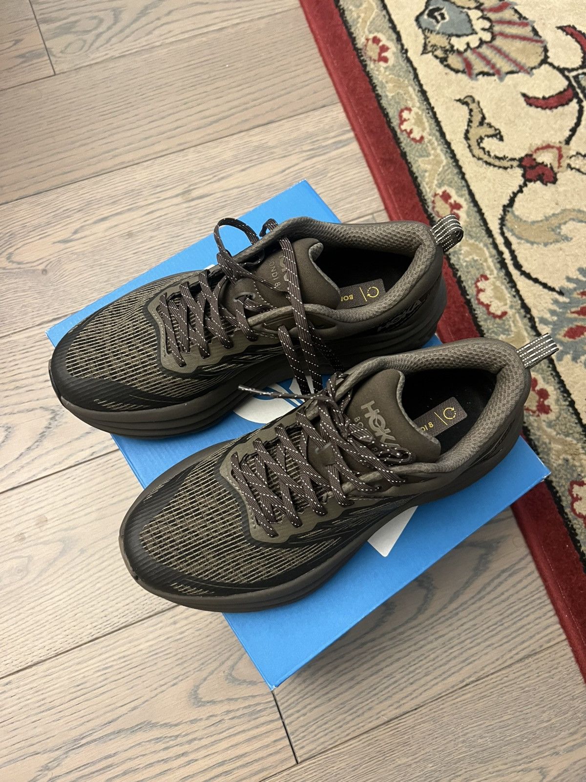 New / never worn dark green Hoka Bondi 8