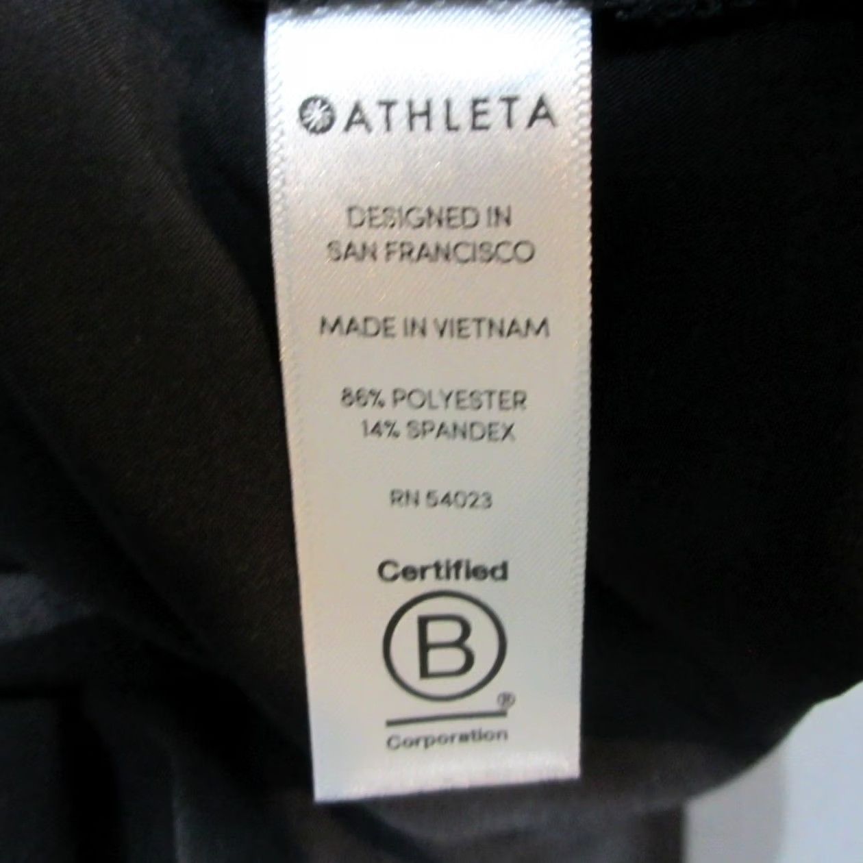 Athleta Athleta Jumpsuit Womens 6 Black Stretch Wide-Leg Pleated Casual V-Neck Tie Back Shirt? Size 28" / US 6 / IT 42 - 4 Thumbnail