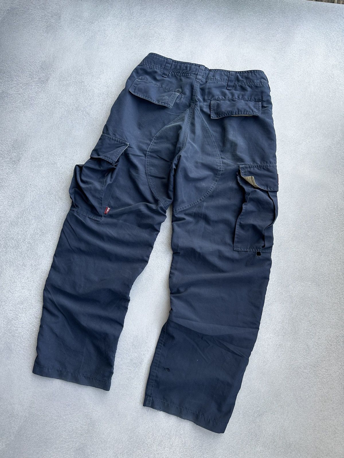 Vintage × World Industries Vintage World Industries 90sUSA Nylon Distressed Cargo Pants Size US 28 / EU 44 - 16 Thumbnail