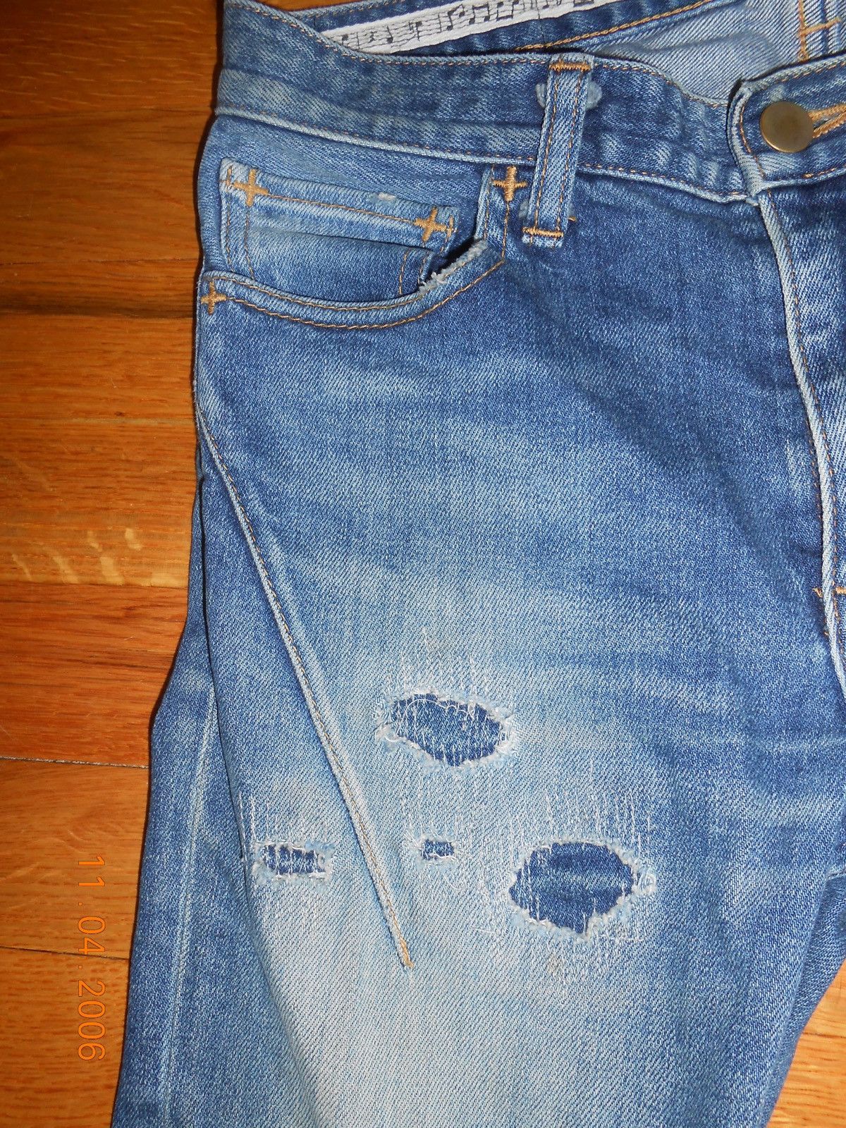 number (n)ine distressed repair denim