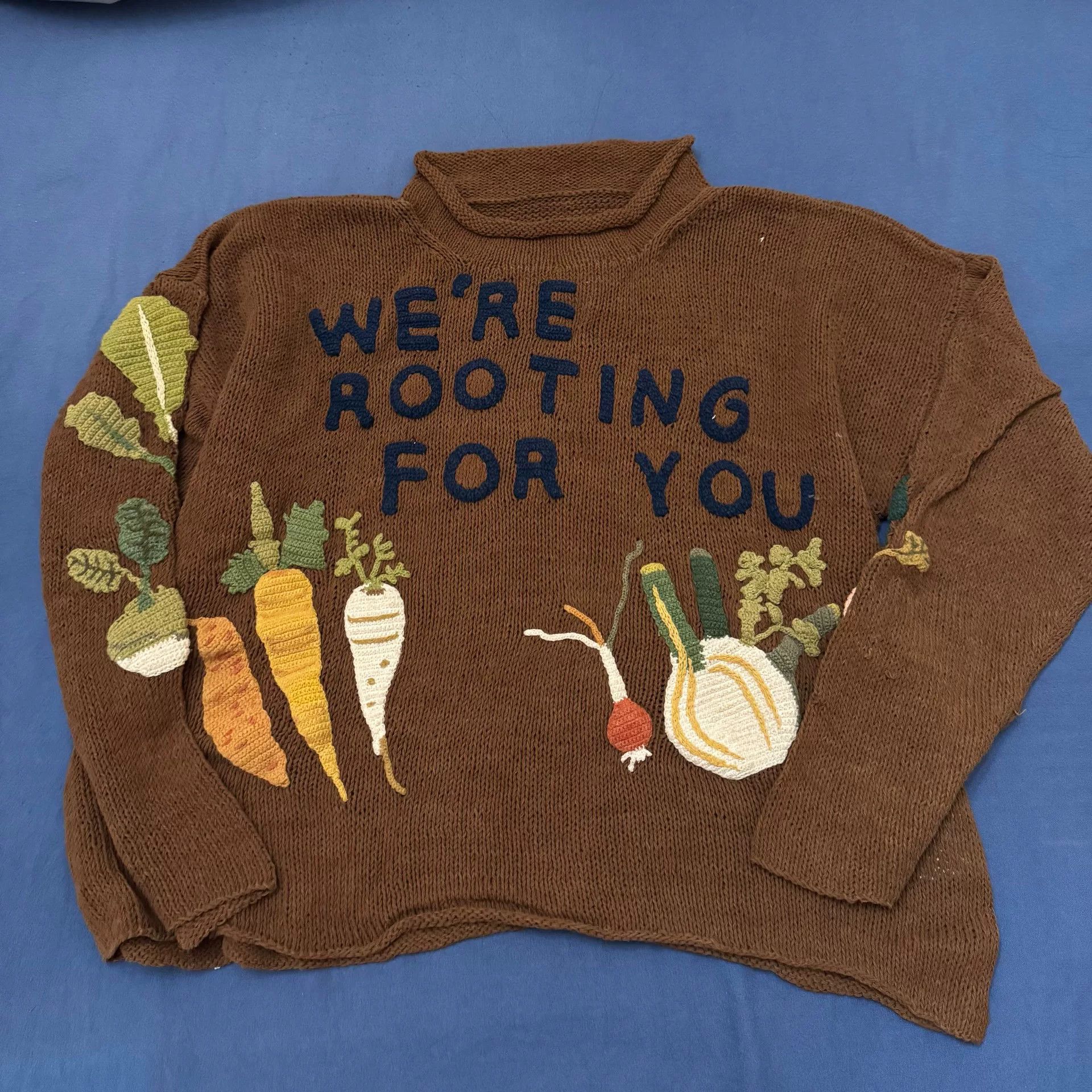 brown knit cardigan with vegetable pattern