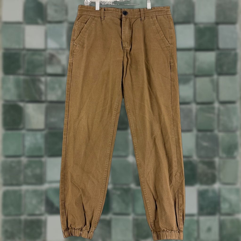 Anthropologie Koto Slim Fit Joggers Mens Size 32 Brown Khaki Chino Casual Pants Regular Cotton Comfort Breathable Front Pocket Slant Casual Classic Jogger Style Size US XS / EU 42 / 0 - 1 Thumbnail