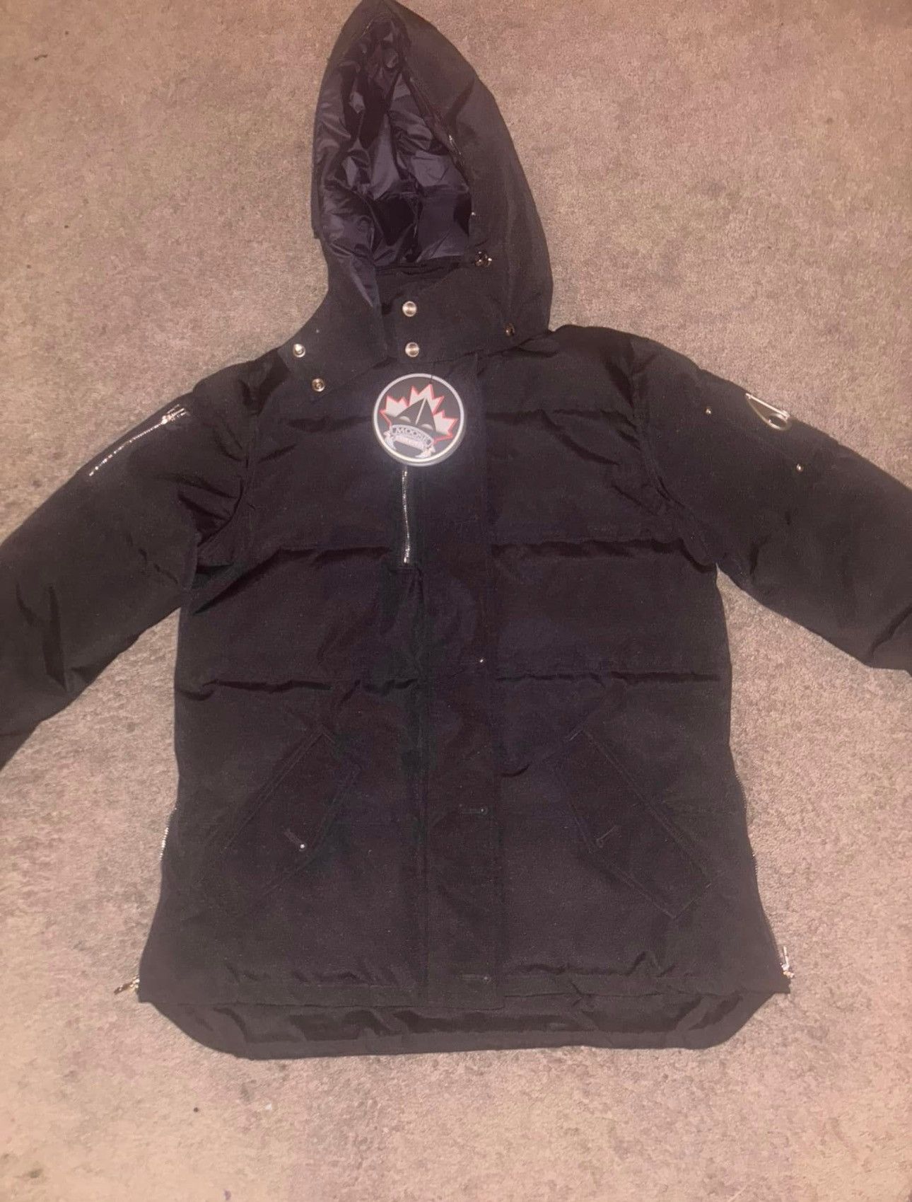 (Moose knuckle coat) will keep you warm and winter ready