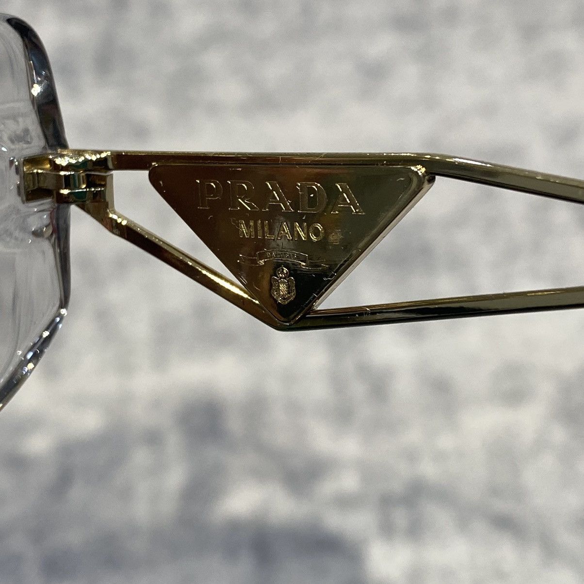 PRADA 0PR 14YS 12R50K TRANSPARENT GREY
