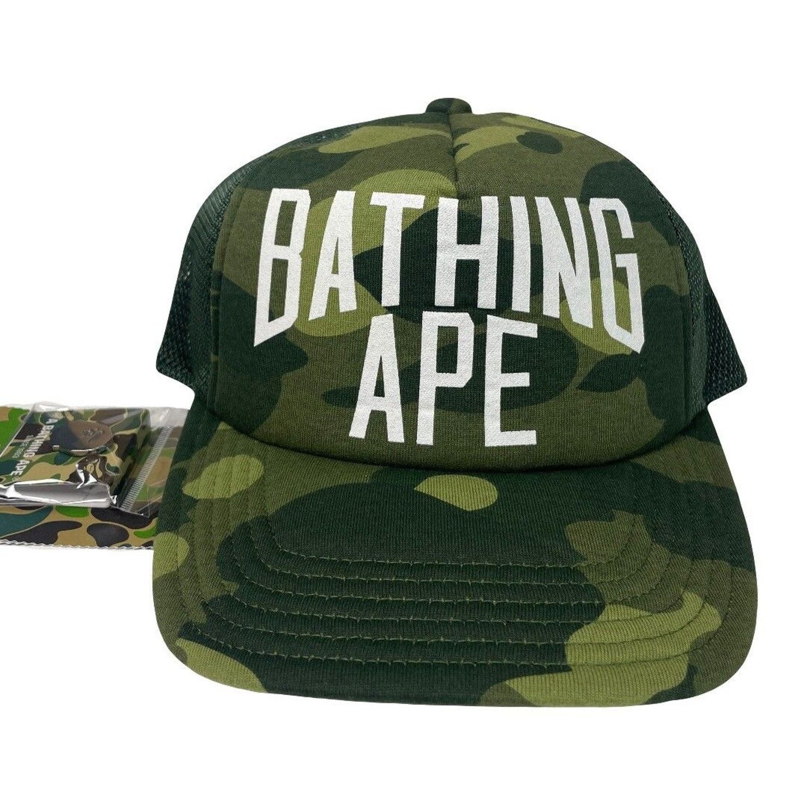 image of Bape Color Camo Nyc Logo Mesh Cap (Fw22) in Green, Men's