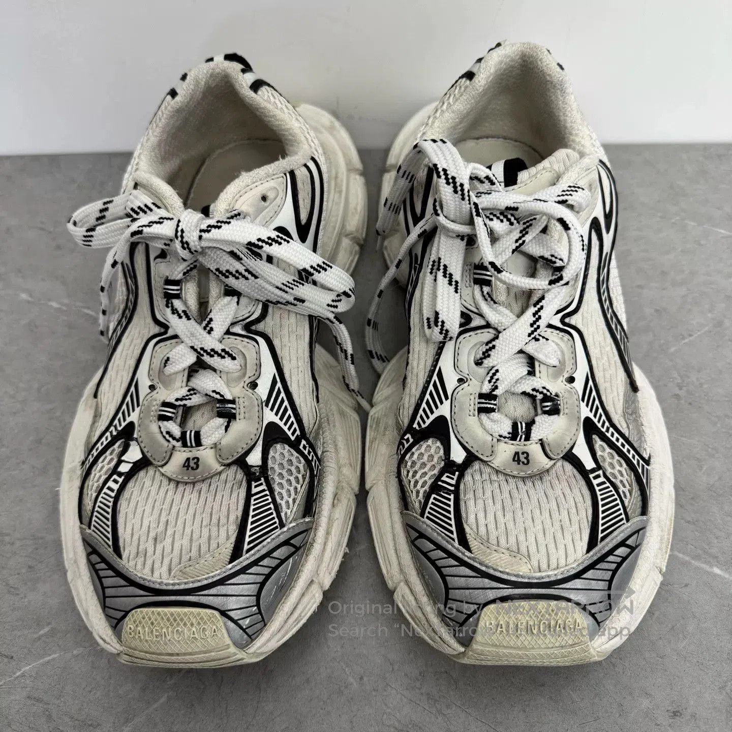 Balenciaga Black and White Panda Dad Shoes.