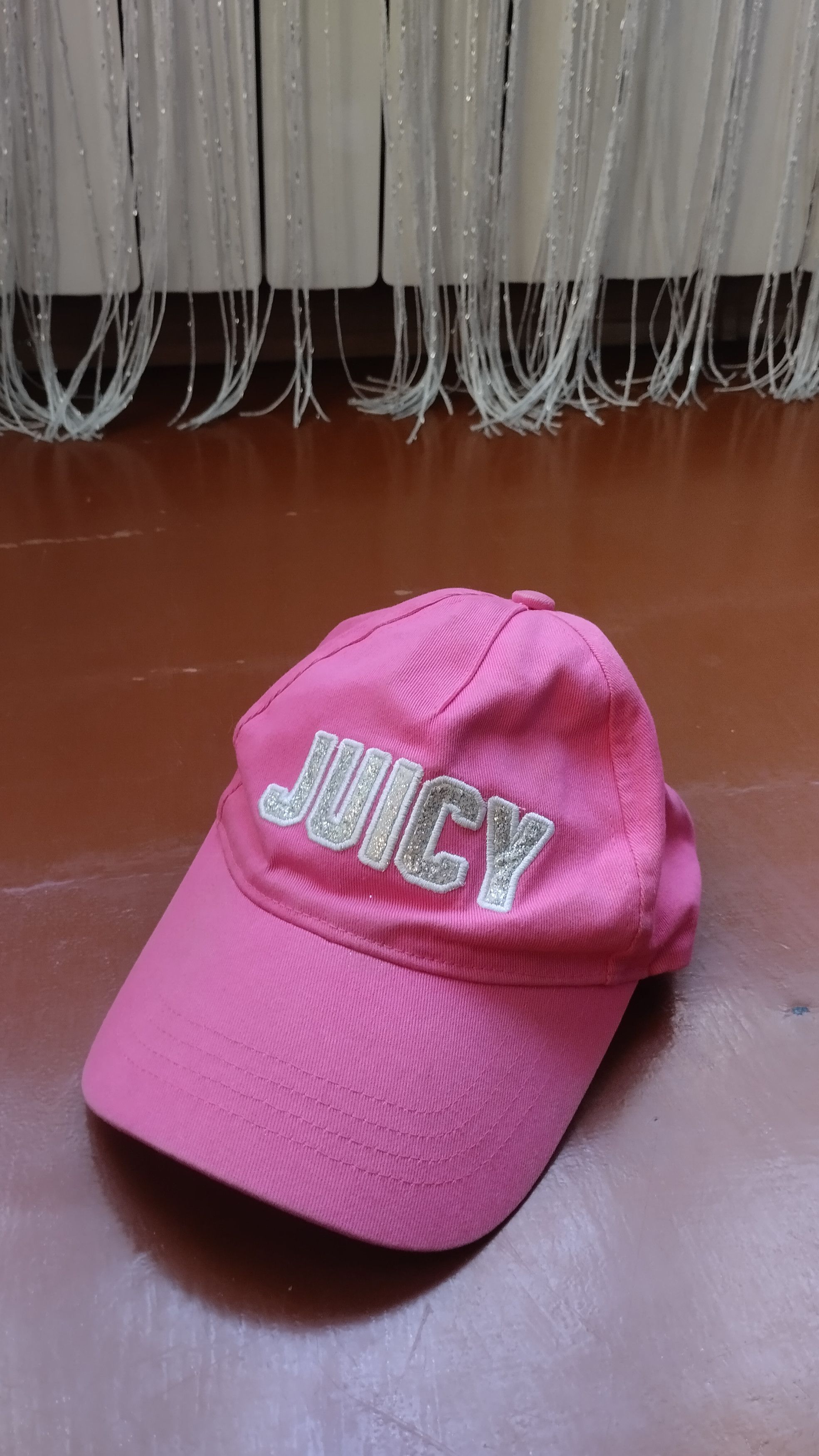 Juicy Couture offers cap