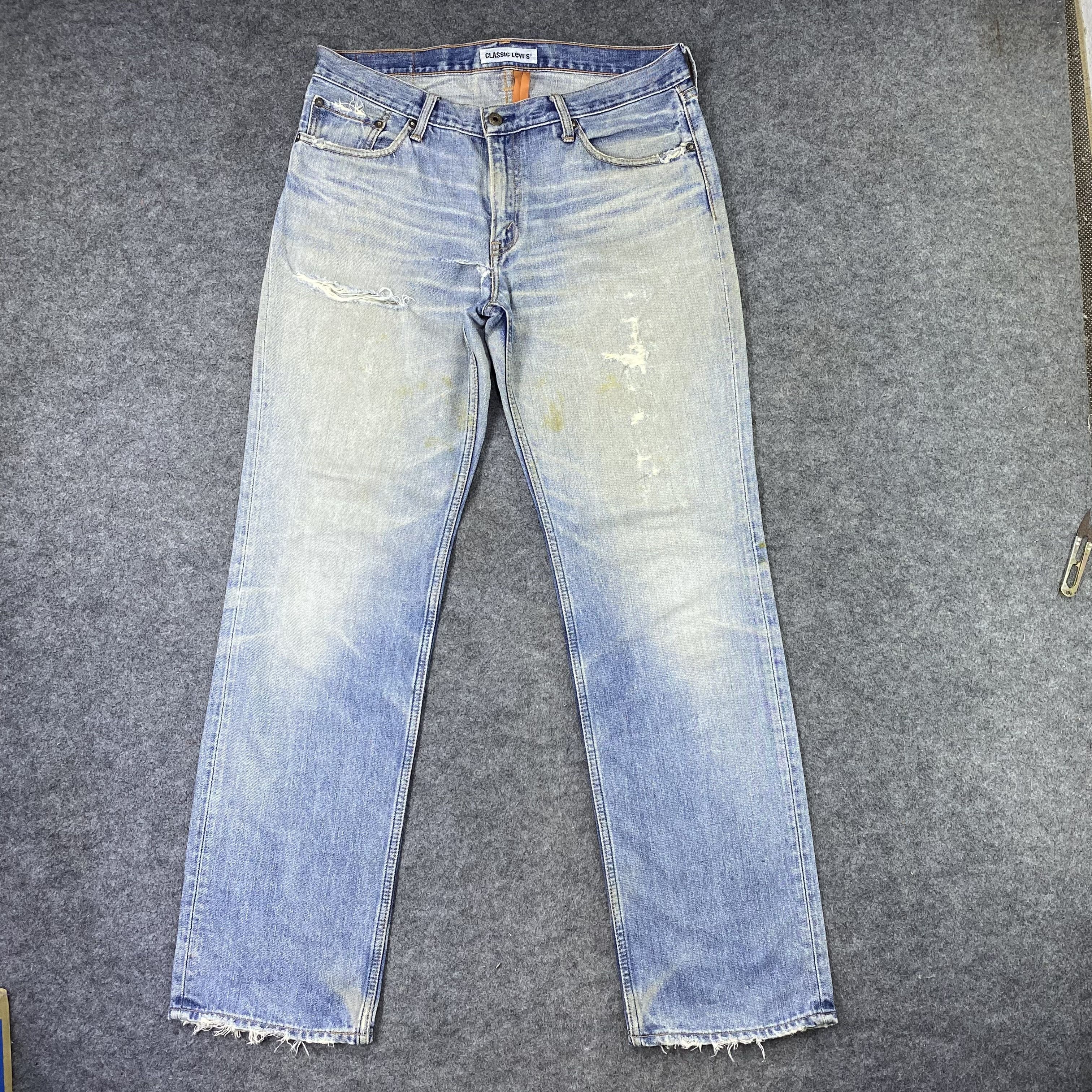 Vintage Levi's 502 Distressed Blue Wash Jeans-J1164