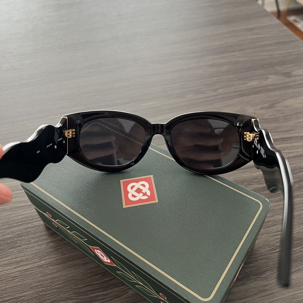 Casablanca Casablanca oval wave sunglasses unisex black and gold Size ONE SIZE - 5 Thumbnail