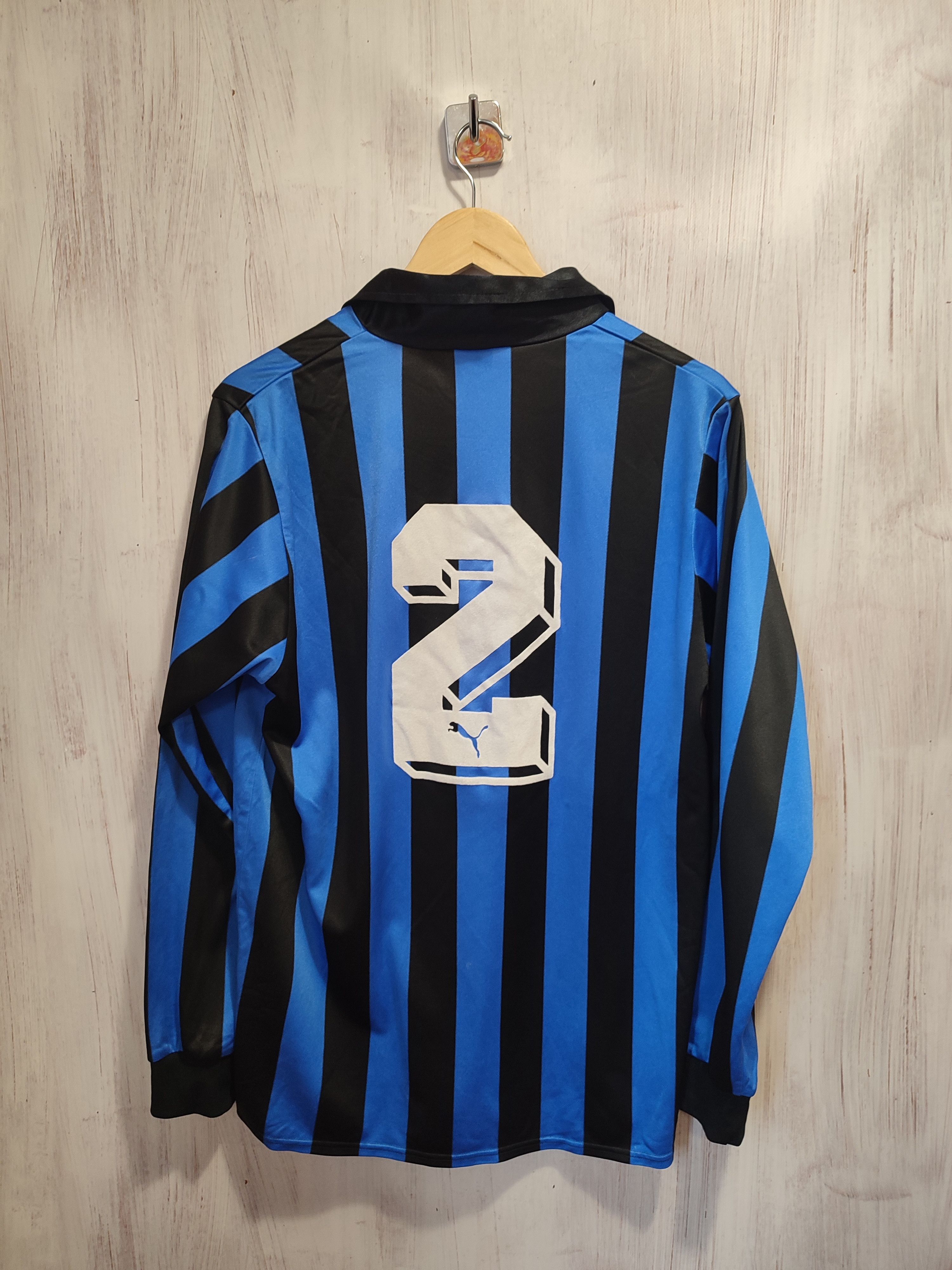 Premium PSD | A blue and yellow long sleeve jersey with the word