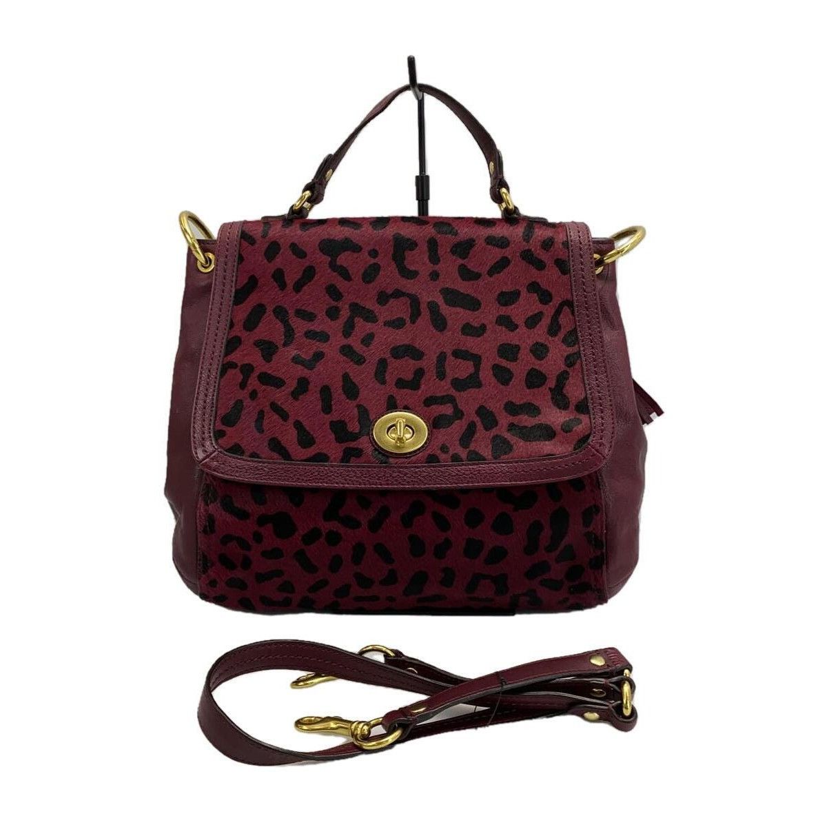 image of Coach Park Hair Calf Turn Lock Flap Satchel In Leopard Oxblo in Oxblood Burgundy, Women's