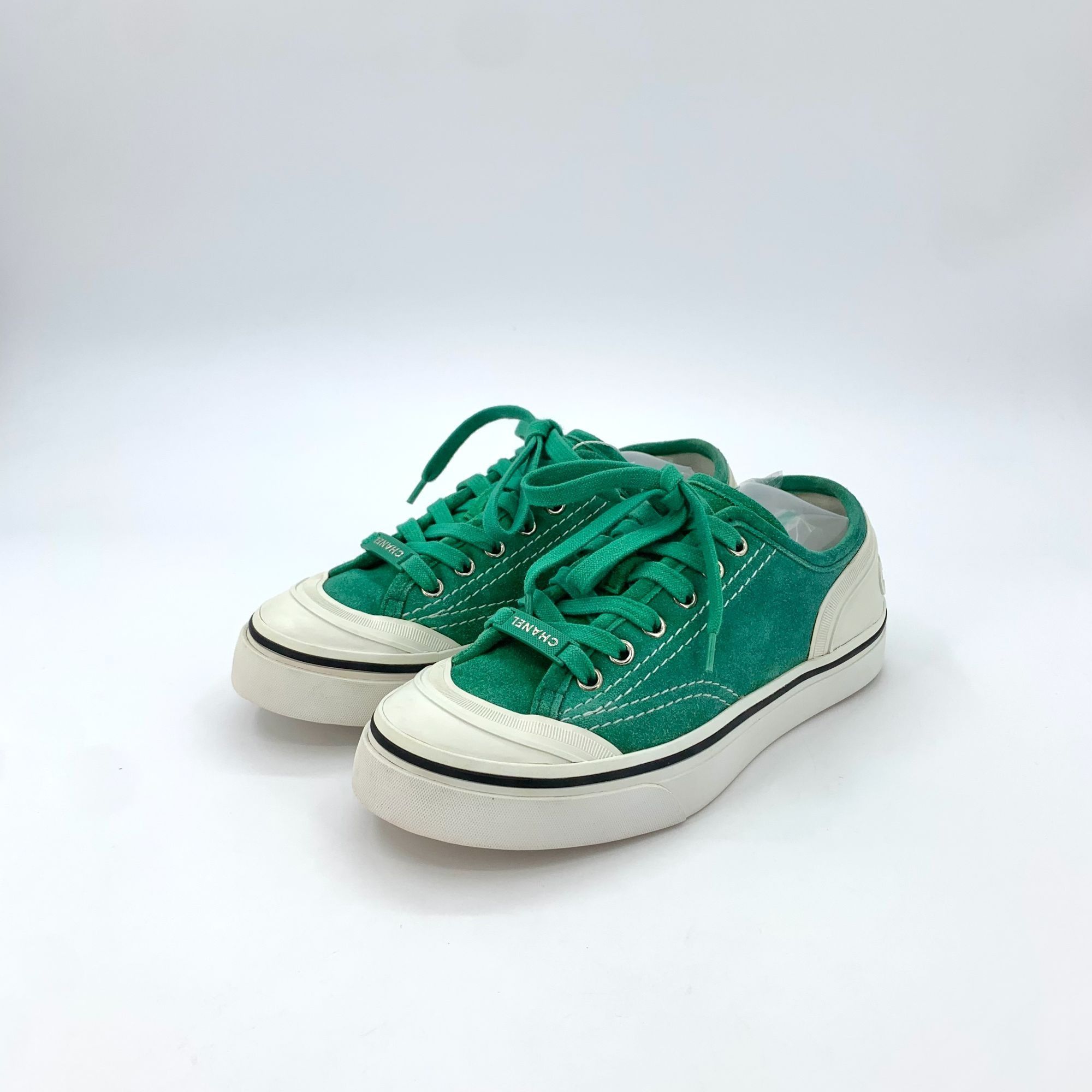 Chanel Green Suede Low-Top Sneakers With Embossed Logo