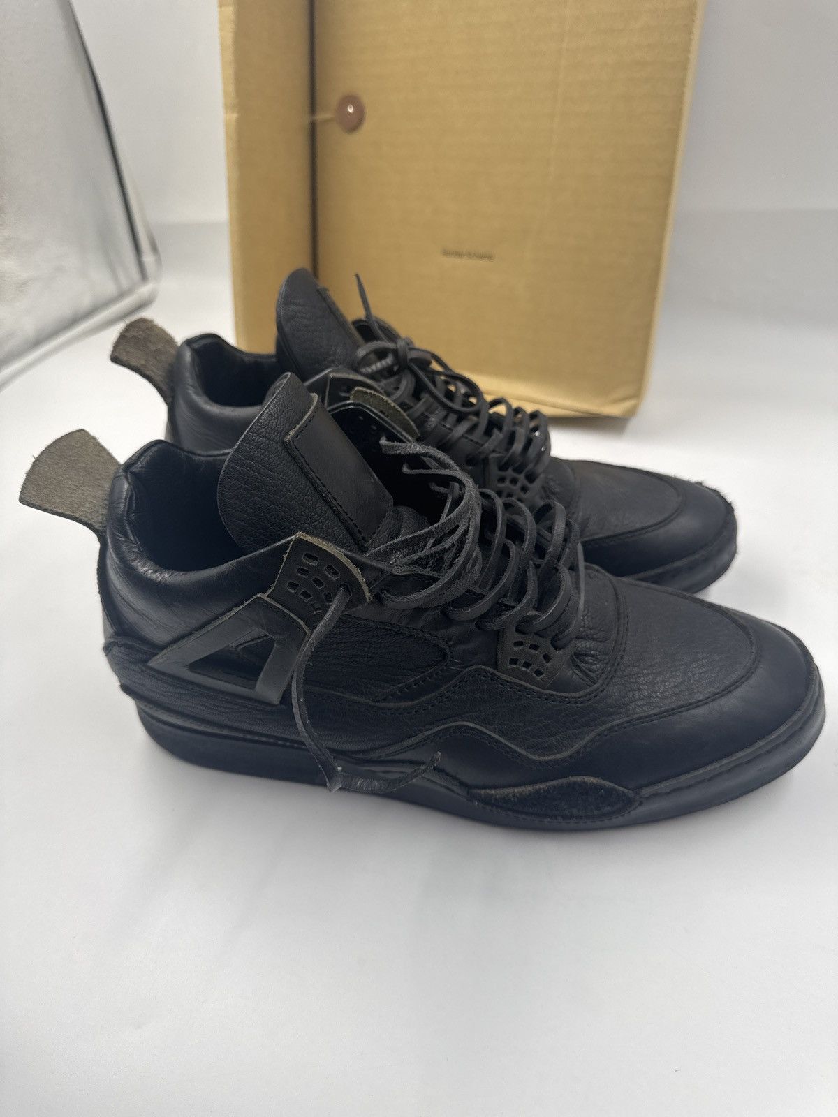 Air Jordan 4 Hender Scheme Triple Black | SneakerFiles