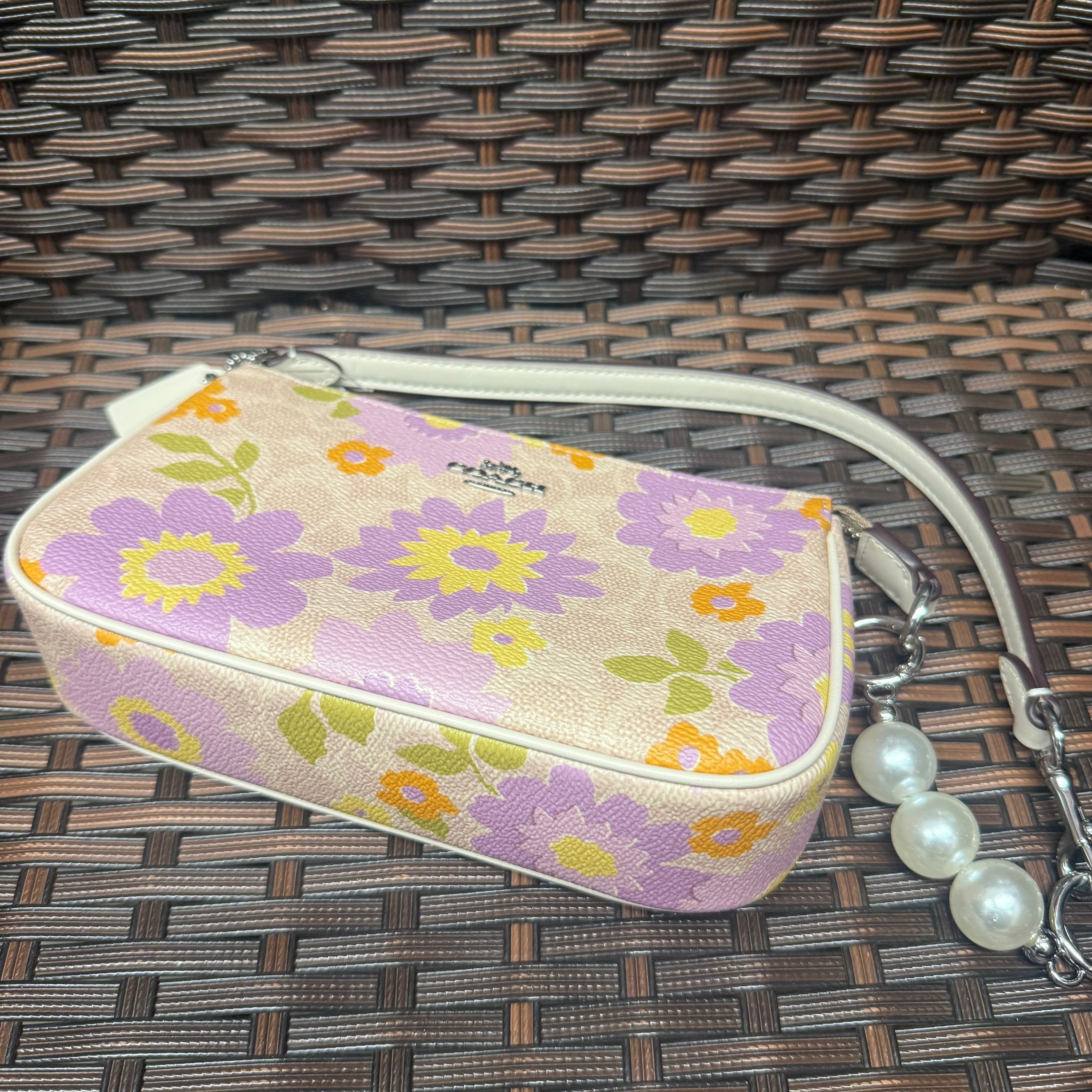 coach Nolita 19 In Signature Canvas With Floral Print cbm73