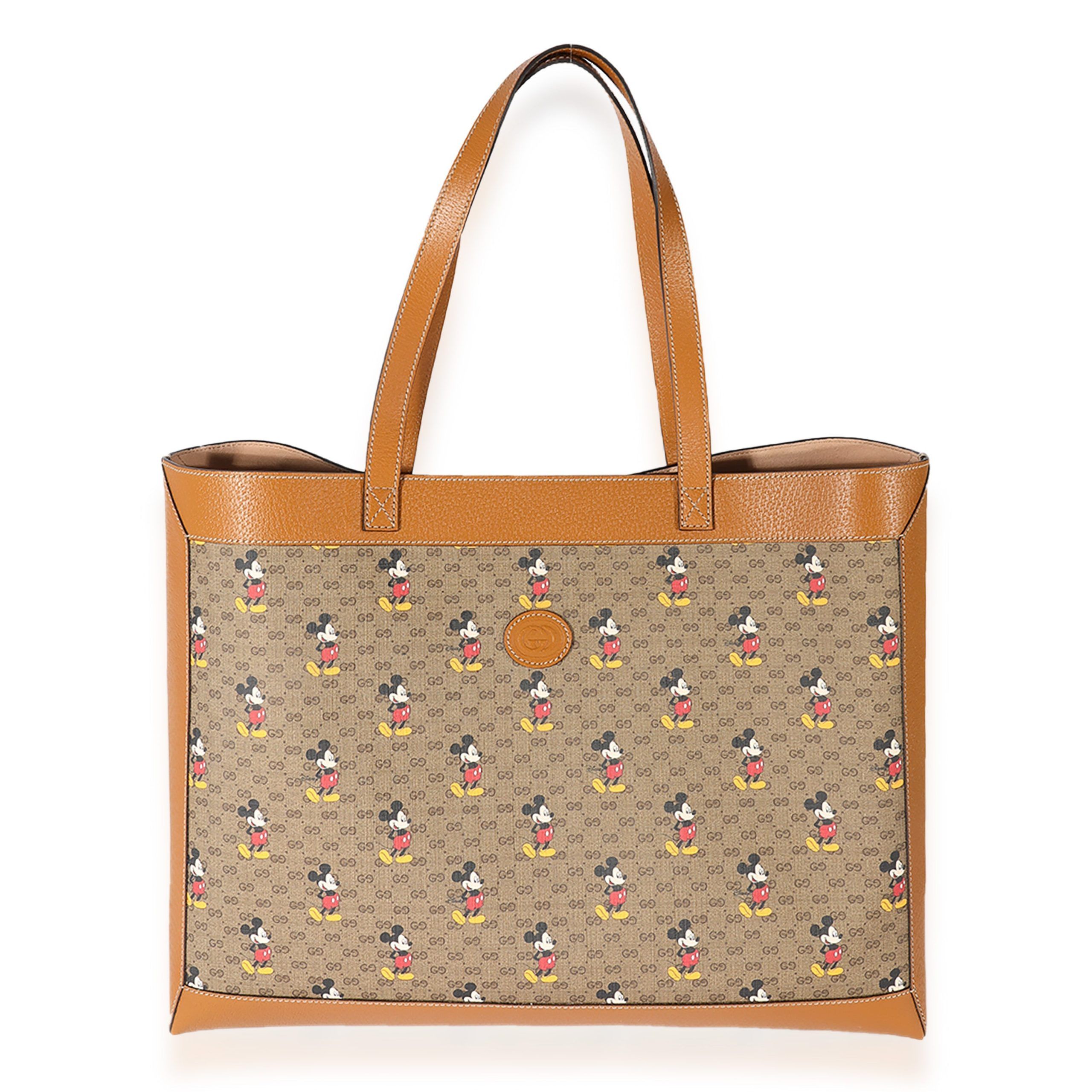 image of Gucci X Disney Vintage GG Supreme Mickey Mouse Shopping Tote in Brown, Women's