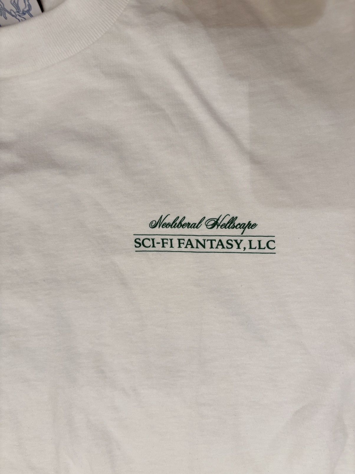 Sci-Fi Fantasy Sci-Fi Fantasy Neoliberal Hellscape Tee Cream Sz S Size US S / EU 44-46 / 1 - 3 Thumbnail