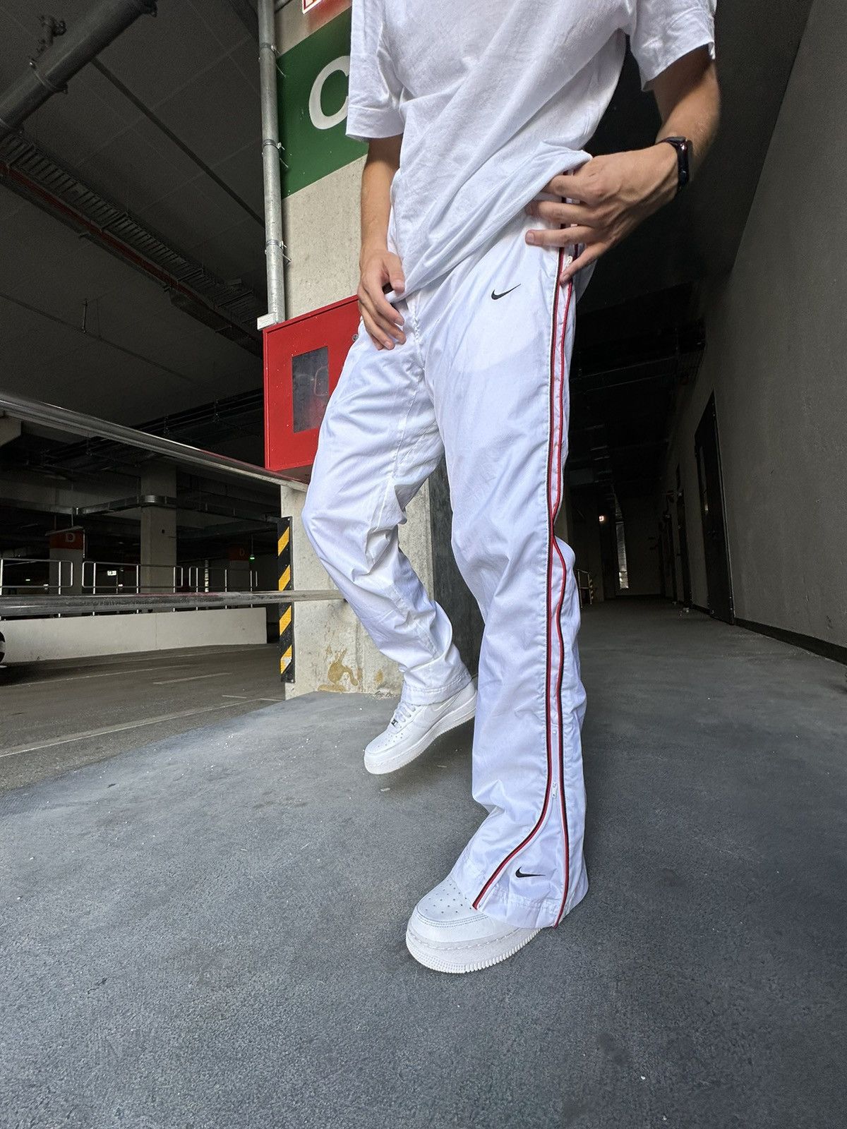 double swoosh track pants