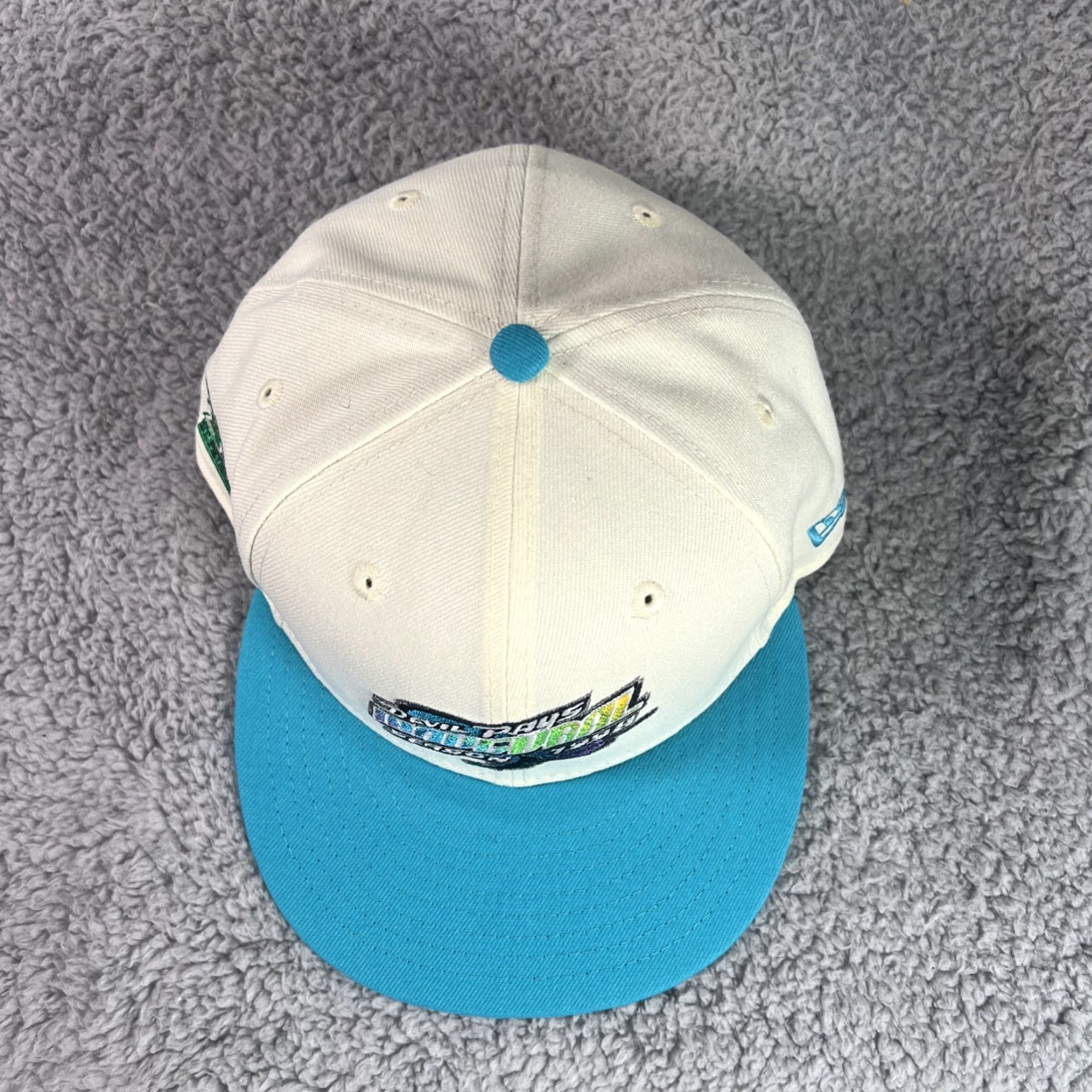 New Era FRESH RAGS New Era Tampa Bay Devil Rays Tropicana Patch 7 5/8 GLOW 1998 SOLD OU Shirt Unisex Adults White Glow 1998 Mens Womens Boys Girls Size ONE SIZE - 5 Thumbnail