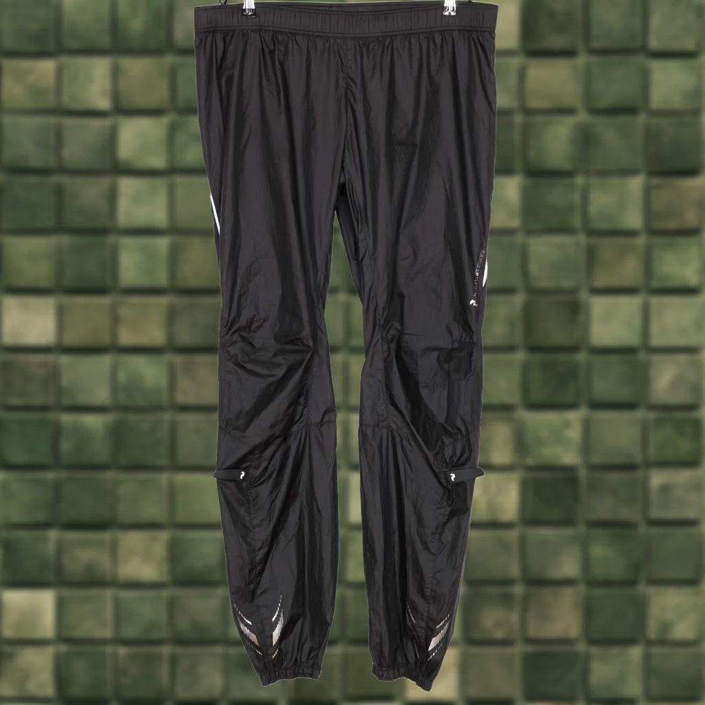 Peak Performance PEAK PERFORMANCE BIEGGA Pants Trousers Men L Lightweight Windbreaker Black Regular 38in Waist 34in Inseam Size US 33 - 1 Thumbnail