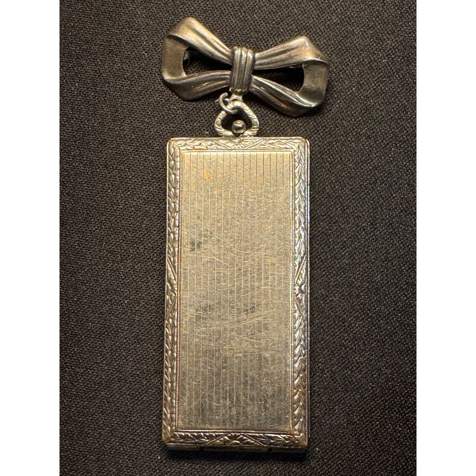 Other Antique Locket Bow Shaped Pin Silver Tone Opens Engraved JM Size ONE SIZE - 2 Thumbnail