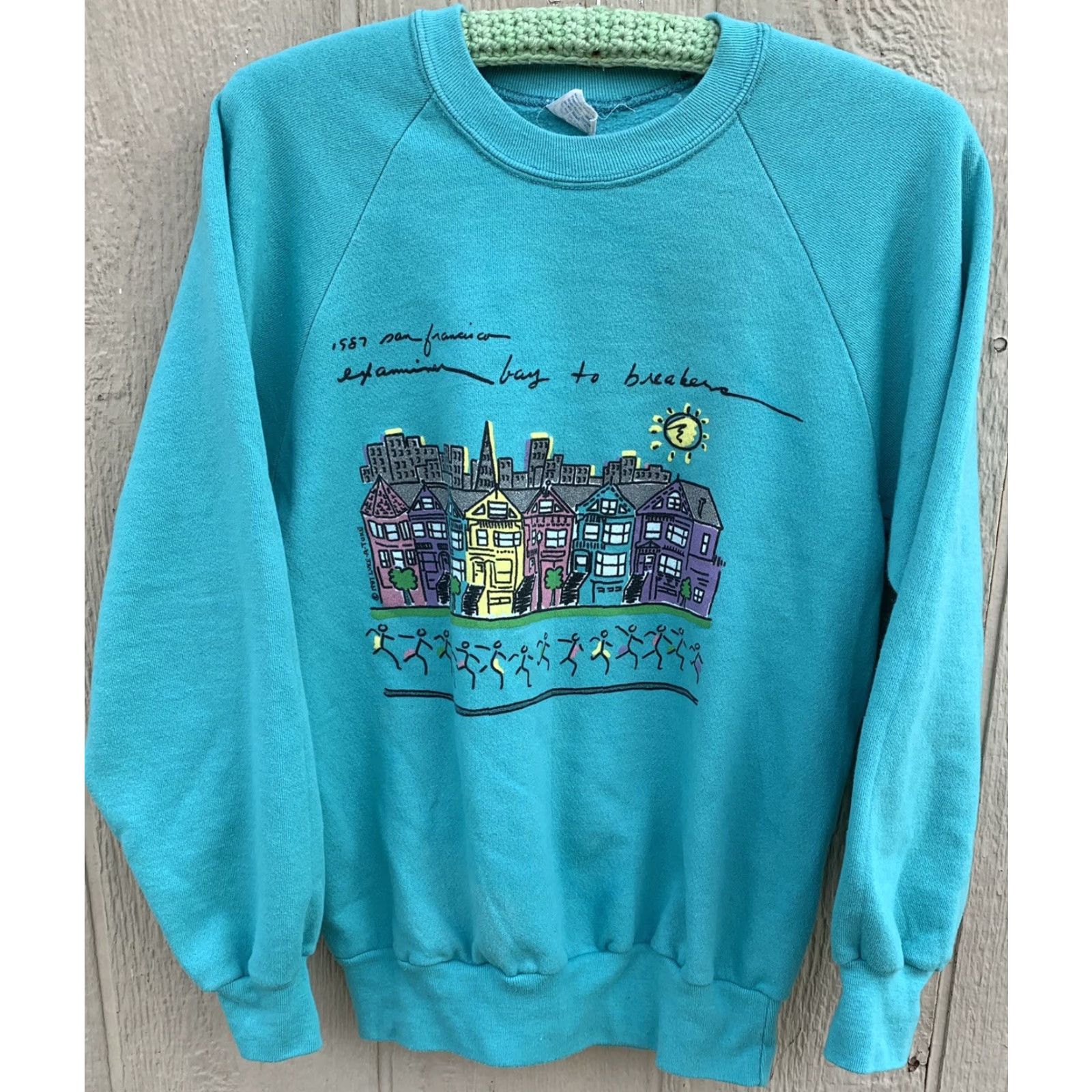 Anvil VINTAGE San Francisco Examiner bay to breakers Raglan Sweatshirt M 80s Blue Graphic Print Unisex Adults Sweatshirt Short Description: None Size US M / EU 48-50 / 2 - 2 Thumbnail