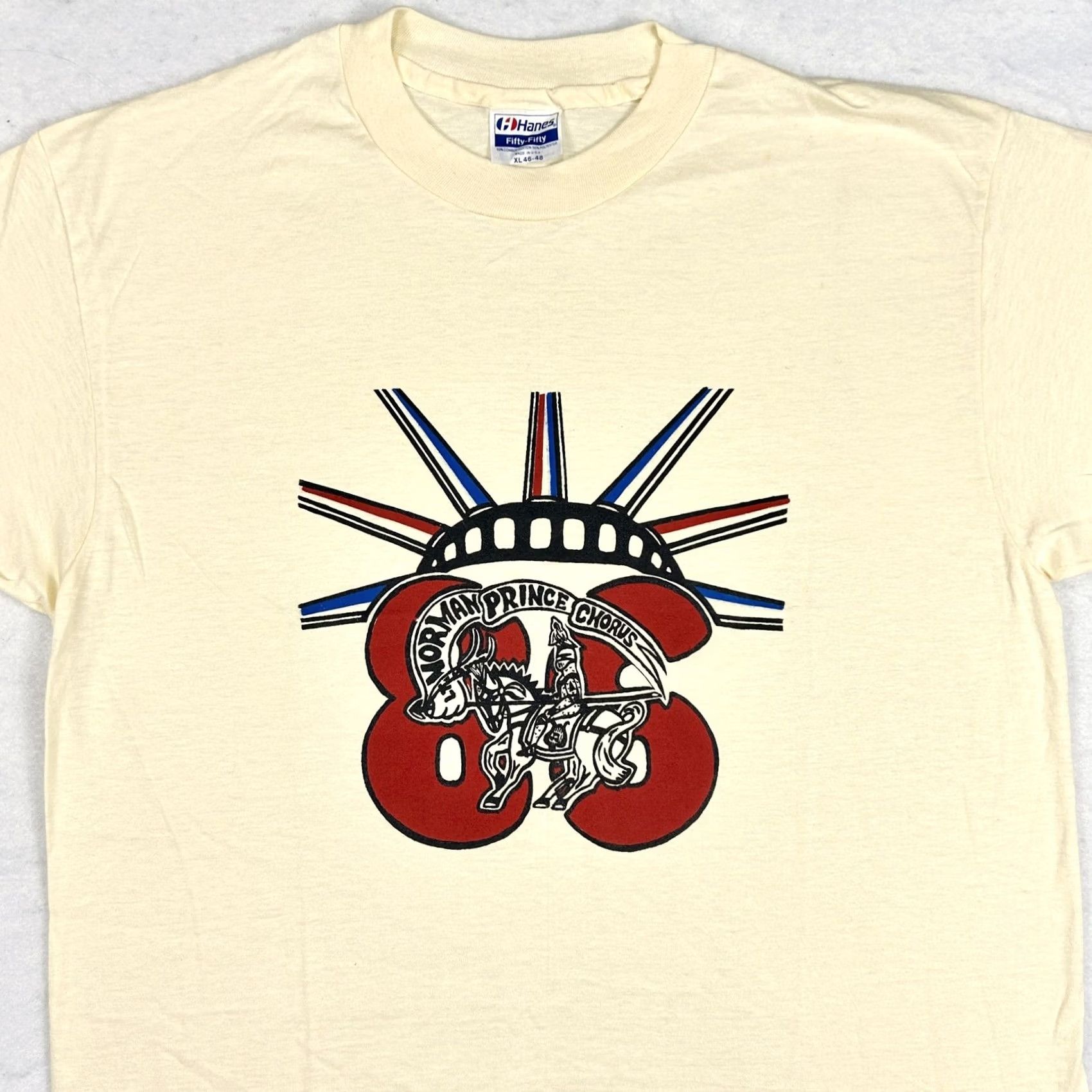 Hanes VINTAGE Norman Prince Chorus T-Shirt L Large Ivory 80s Mens Hanes Cotton Blend Shirt 80s Theme Size US L / EU 52-54 / 3 - 4 Thumbnail
