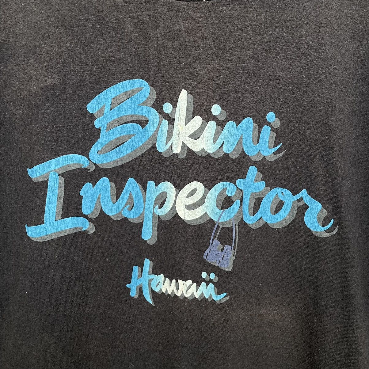 Vintage Vintage 1980s Hawaii Bikini Inspector Faded Black T Shirt Size US XL / EU 56 / 4 - 2 Thumbnail