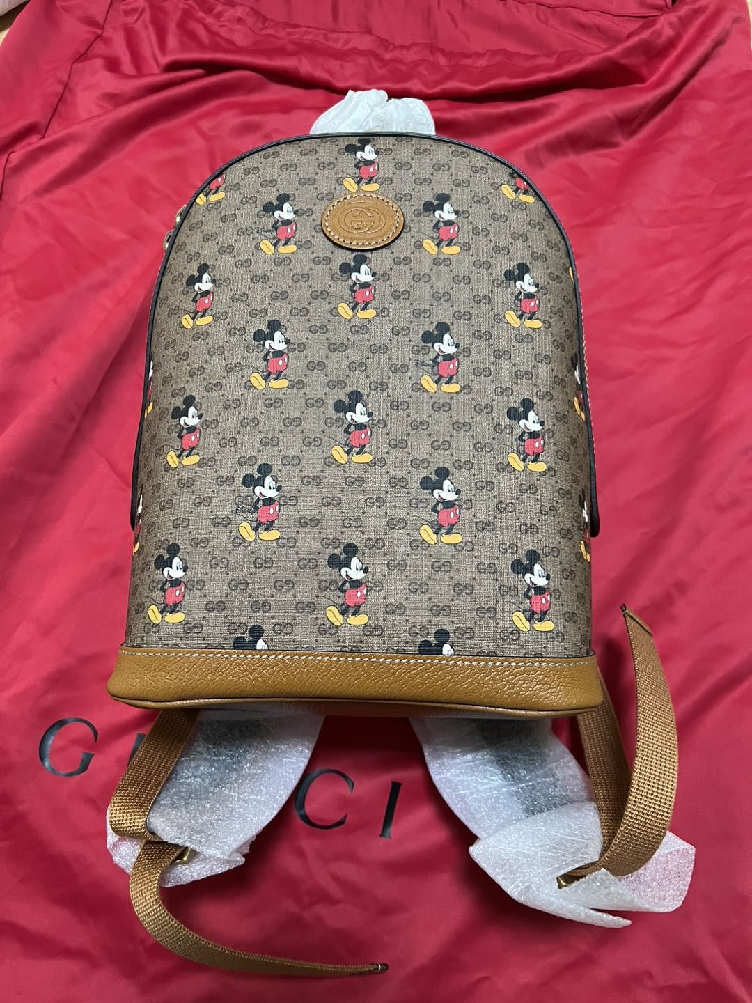 image of Gucci X Disney Micro GG Mickey Mouse Dome Backpack in Beige, Women's