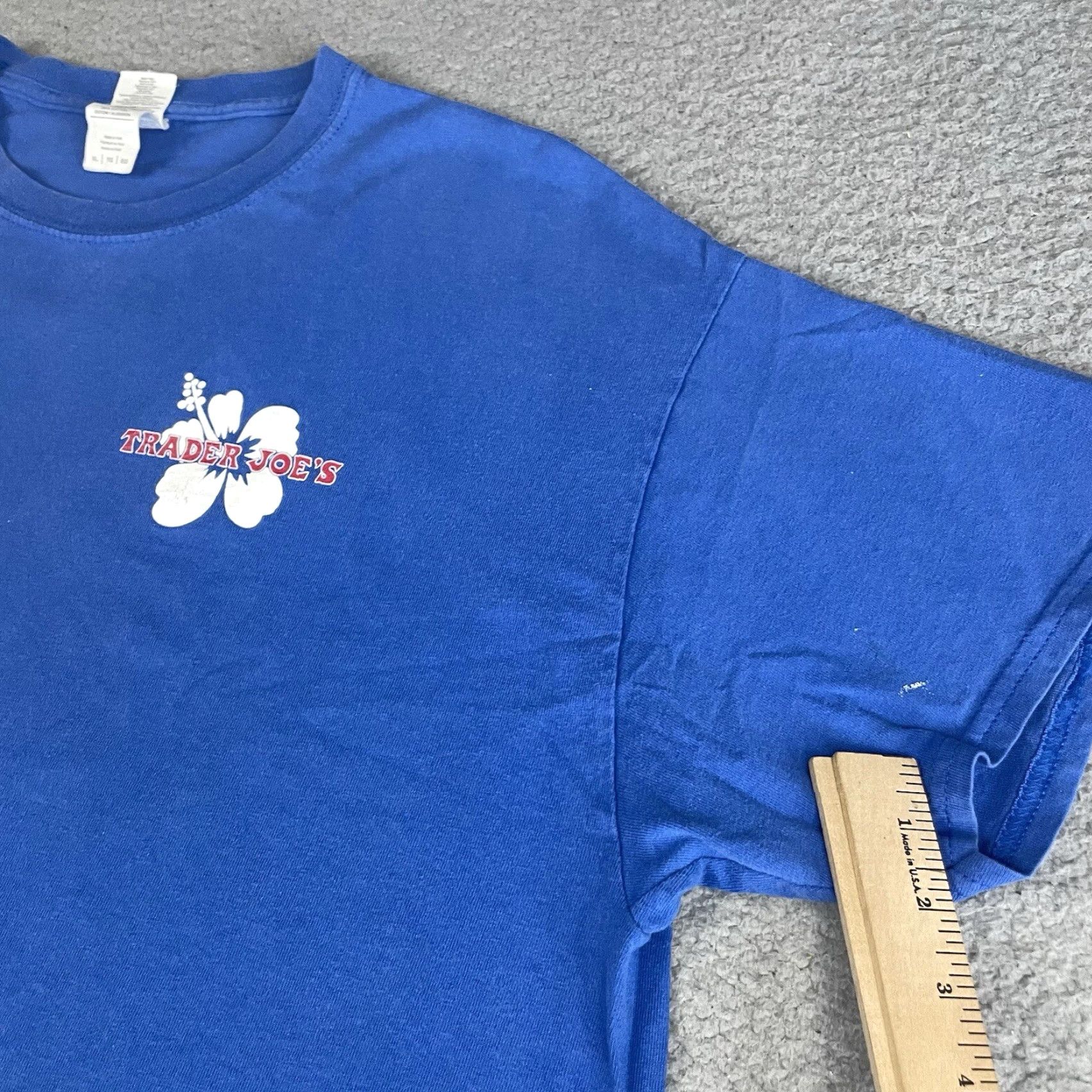 Gildan VINTAGE Trader Joe’s Shirt XL Blue Gildan Unisex Adults T-Shirt Short Sleeve Crew Neck Logo Distressed USA 2010-2019 Size US XL / EU 56 / 4 - 5 Thumbnail
