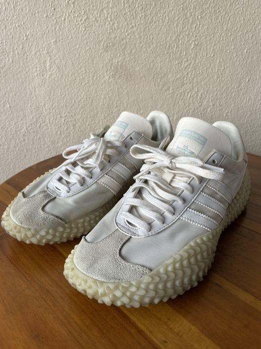 Adidas white store kamanda