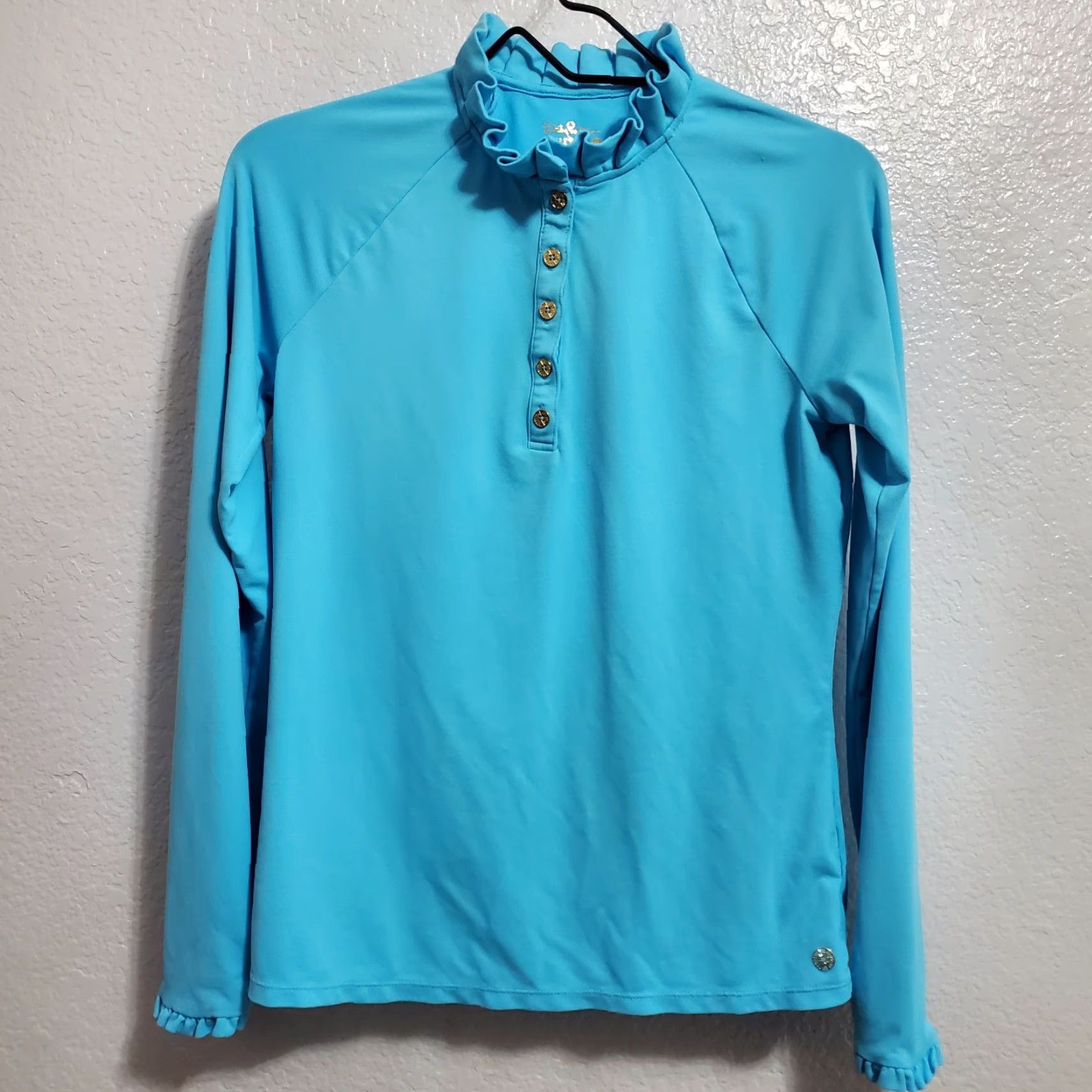 Lilly Pulitzer **Lilly Pulitzer Women's Blue Long Sleeve Ruffle Collar Polo Shirt** User: **Lilly Pulitzer Women's Blue Long Sleeve Ruffle Collar Polo Shirt** Size S / US 4 / IT 40 - 2 Thumbnail