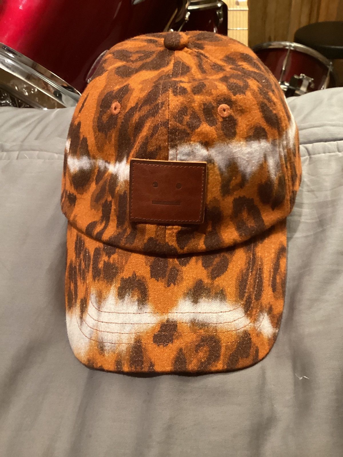 Acne Studios bleach stripe leopard print hat