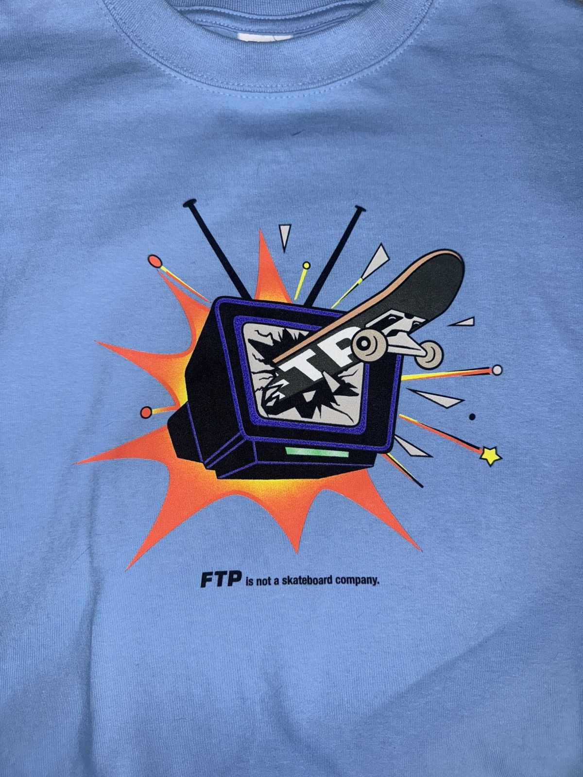 Fuck The Population × G59 Records FTP TV GUIDE TEE SKY BLUE SIZE SMALL Size US S / EU 44-46 / 1 - 1 Thumbnail