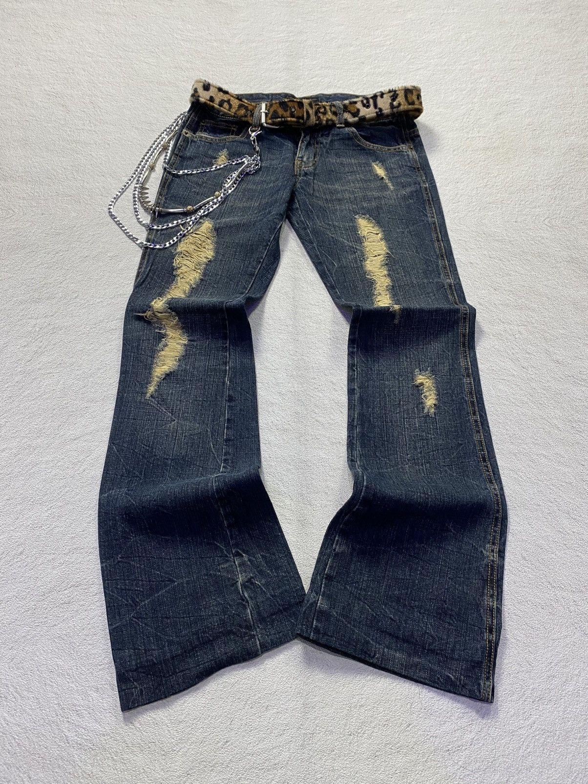 Pink kiss distressed mudwash flare jean