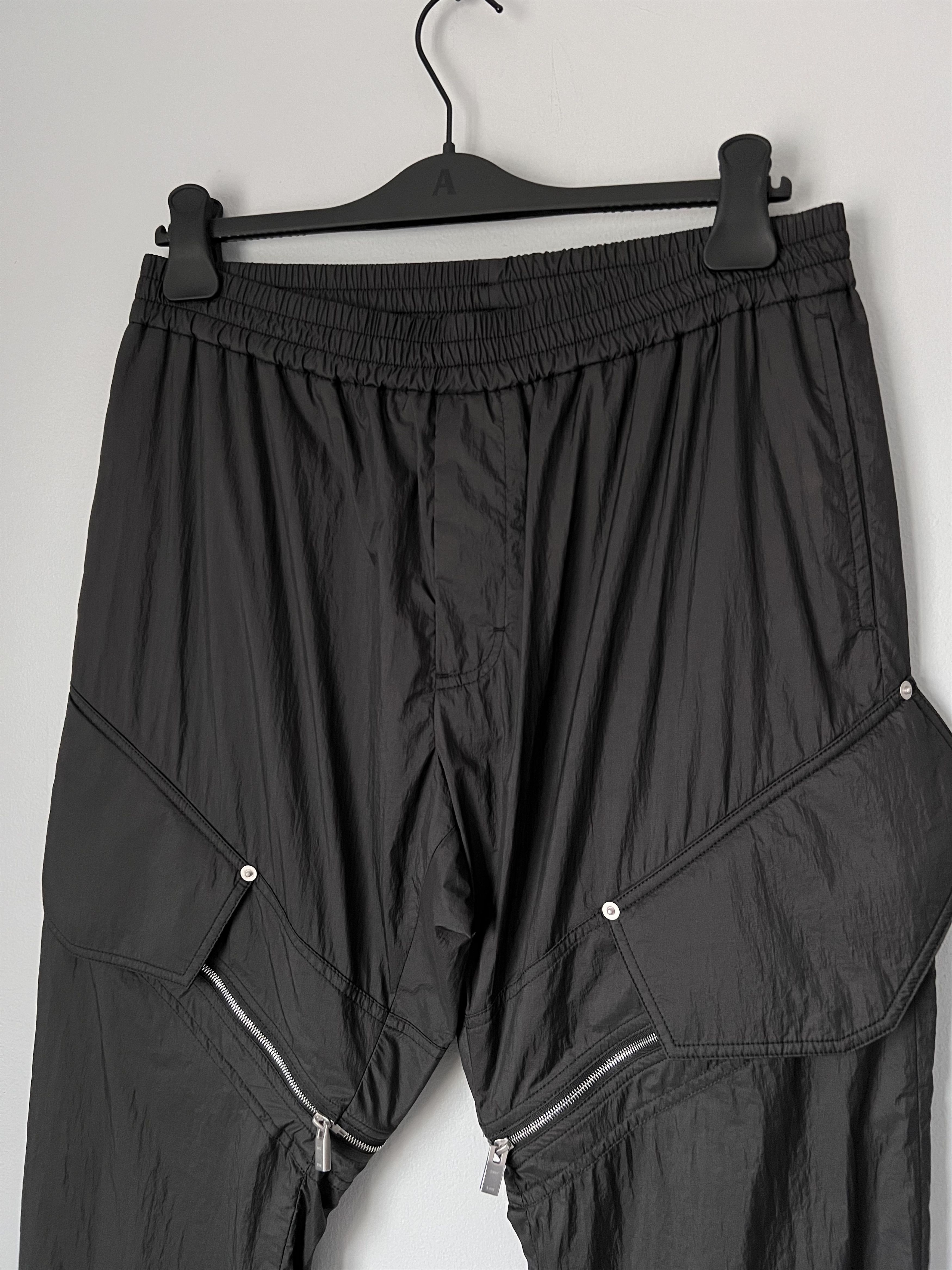 1017 ALYX 9SM 1017 Alyx 9SM Slanted Zip Cargo Track Pants in Black Size US 34 / EU 50 - 2 Thumbnail