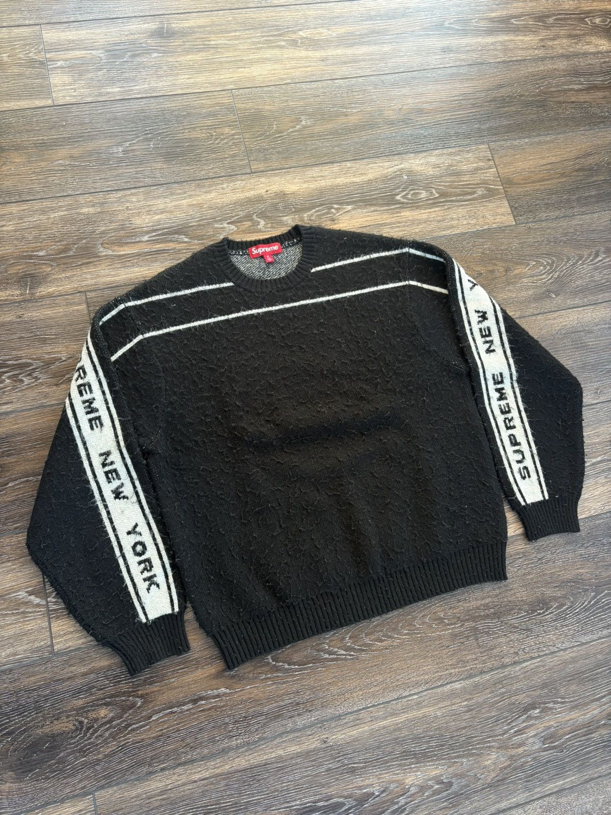 Supreme Supreme Back Stripe Sweater FW24 Black | Grailed