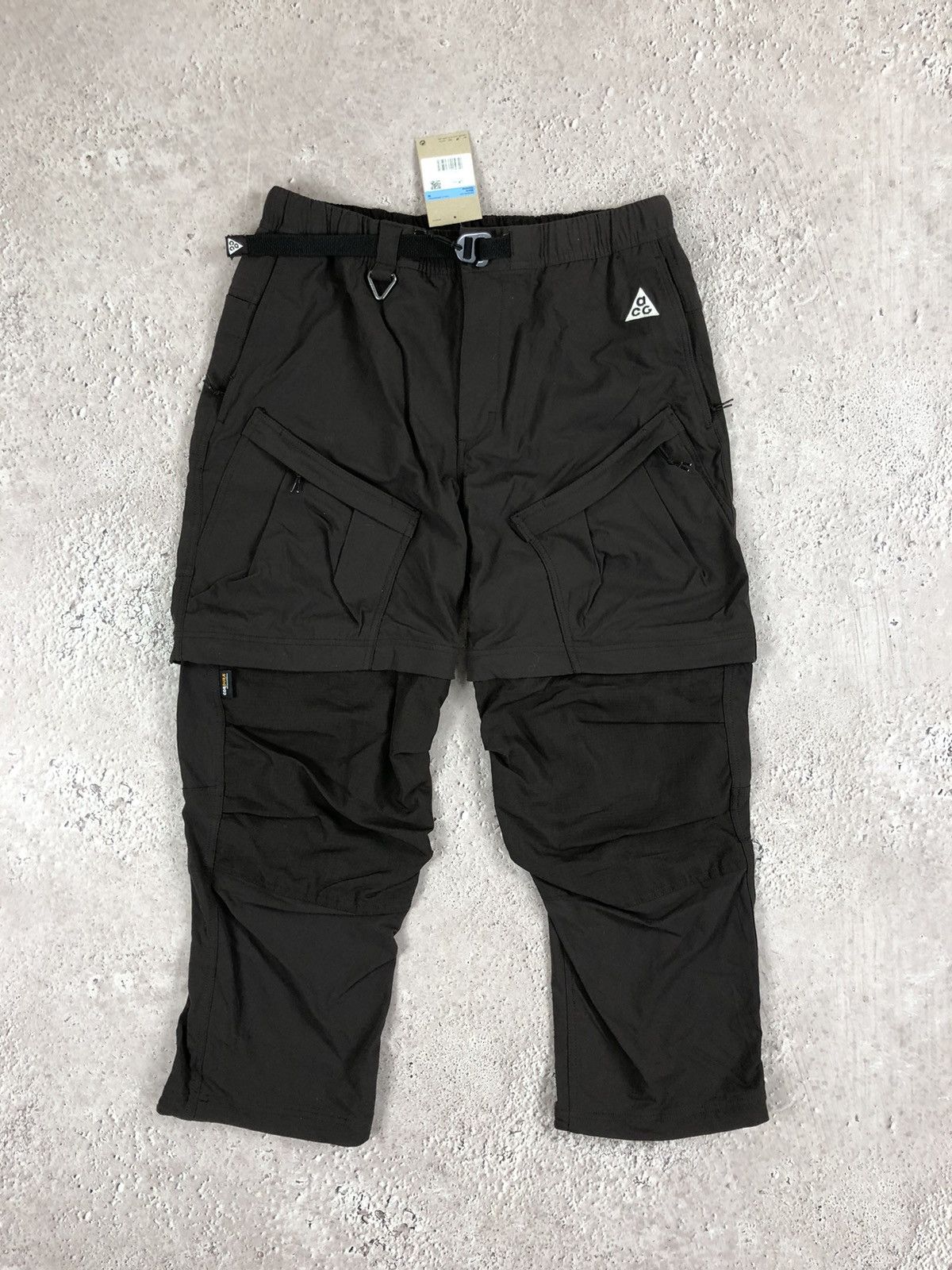 Image of Nike Acg Cargo Transformer Pants in Navy Brown, Men's (Size 33)