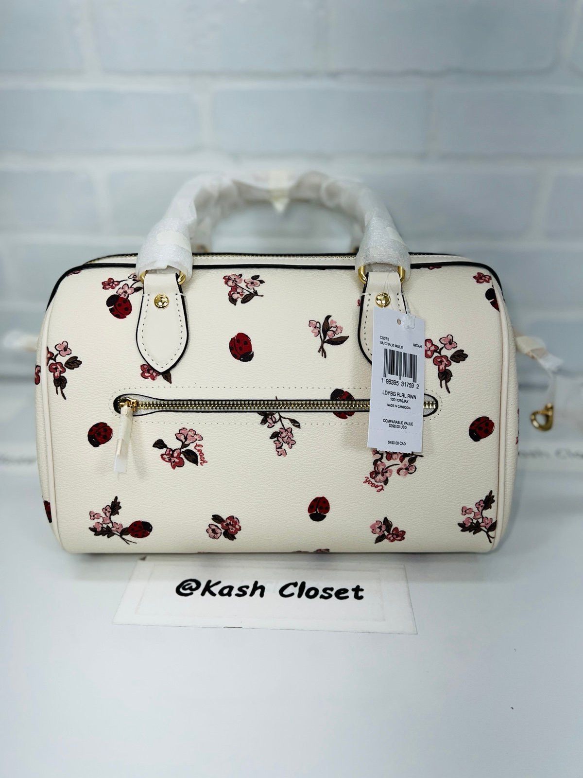 New Coach with tags. Woman's Rowan Satchel and retailer Wallet with floral print Chalk mu