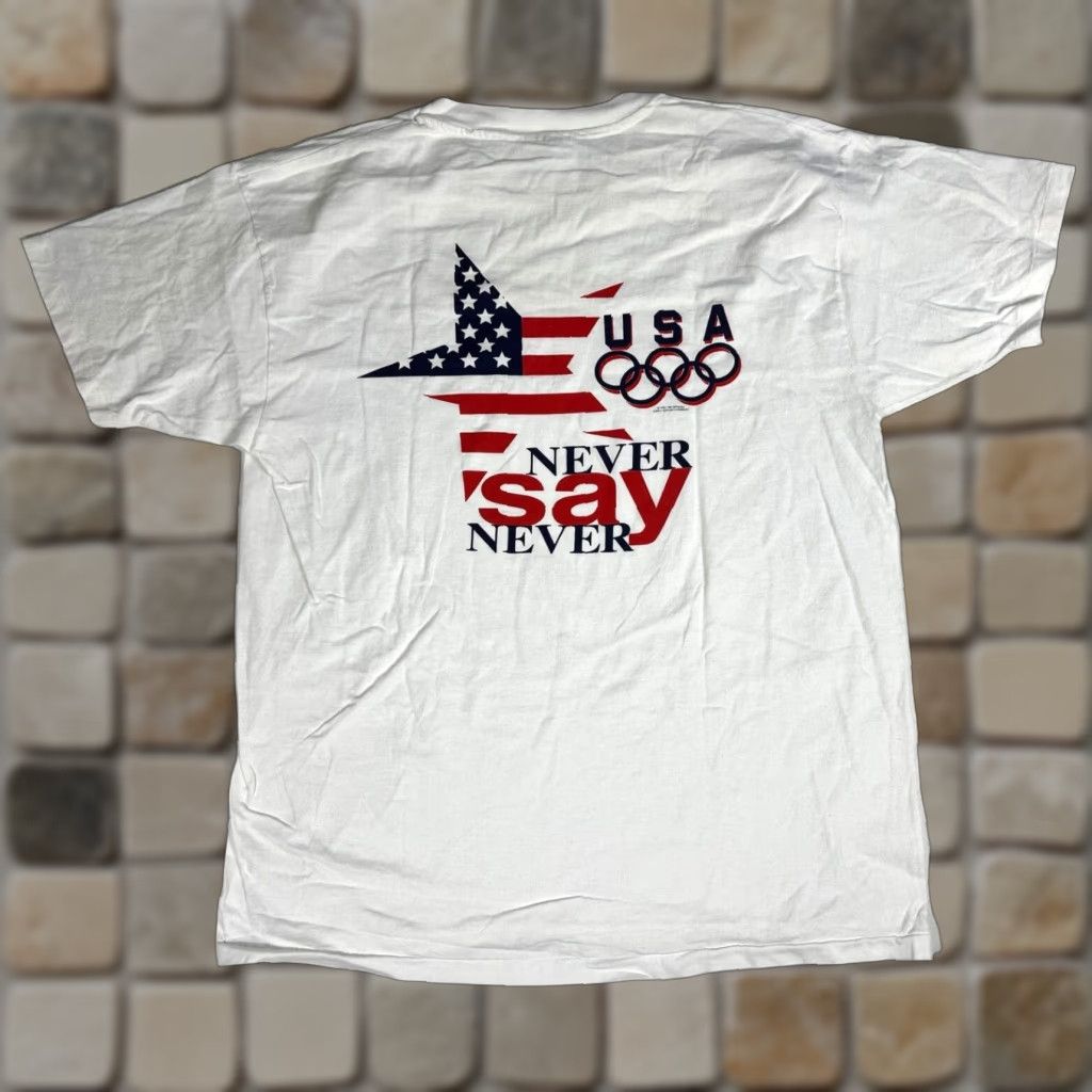 Champion VINTAGE Champion T-Shirt Never Say Never USA Olympics 90s Men XL White 100% Cotton Short Sleeve Crew Neck Graphic Print Size XL Size US XL / EU 56 / 4 - 1 Thumbnail