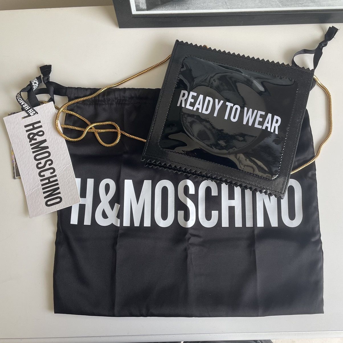 Moschino condom bag hotsell