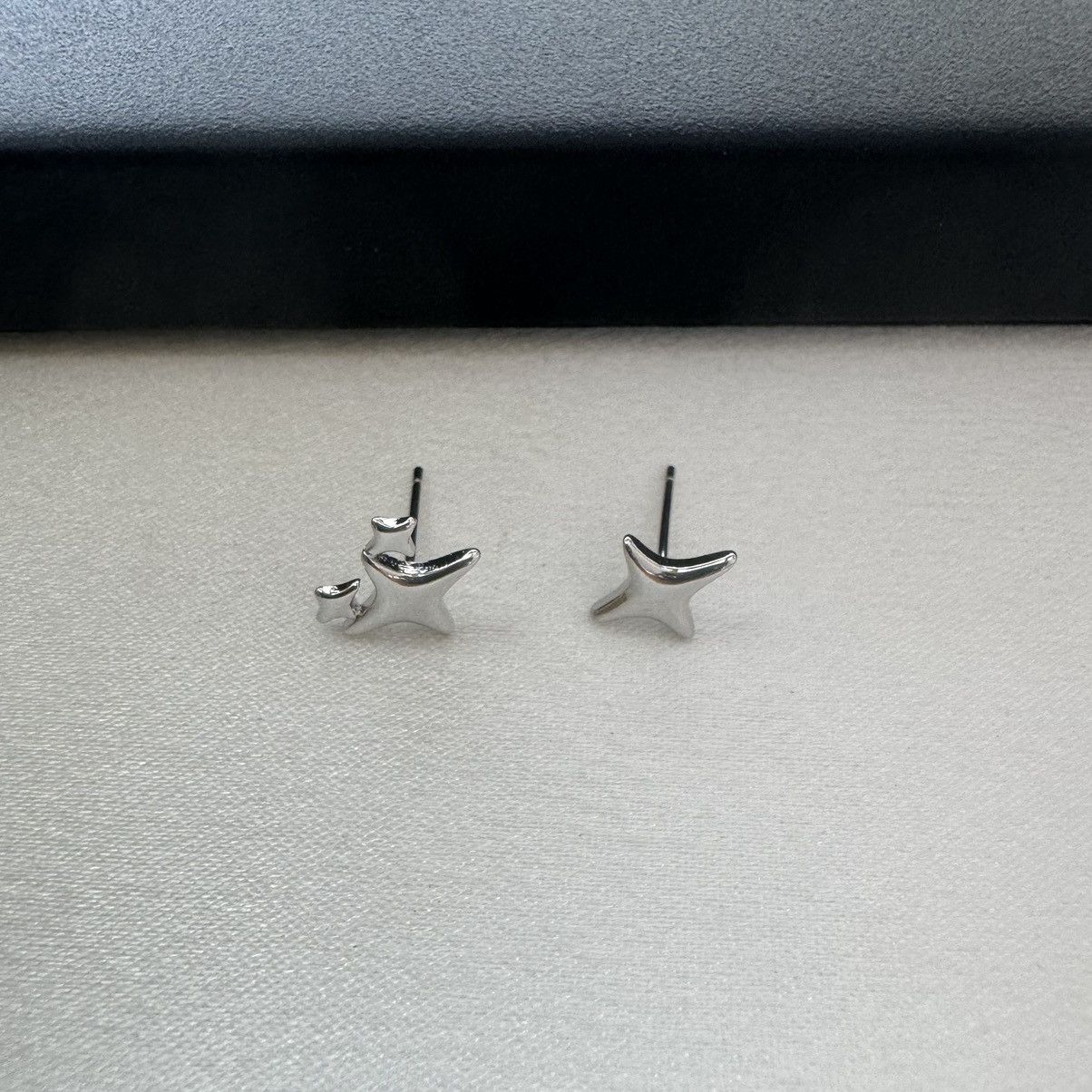 Designer Asymmetry Four-pointed Star Stud Earrings for Women Men Size ONE SIZE - 1 Thumbnail