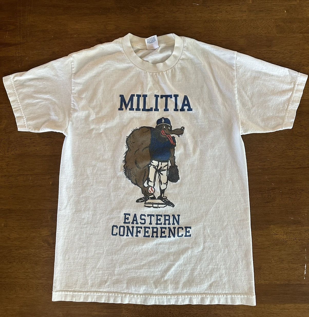 image of Supreme Wtaps Metal Militia Eastern Conference Tee in White, Men's (Size Medium)