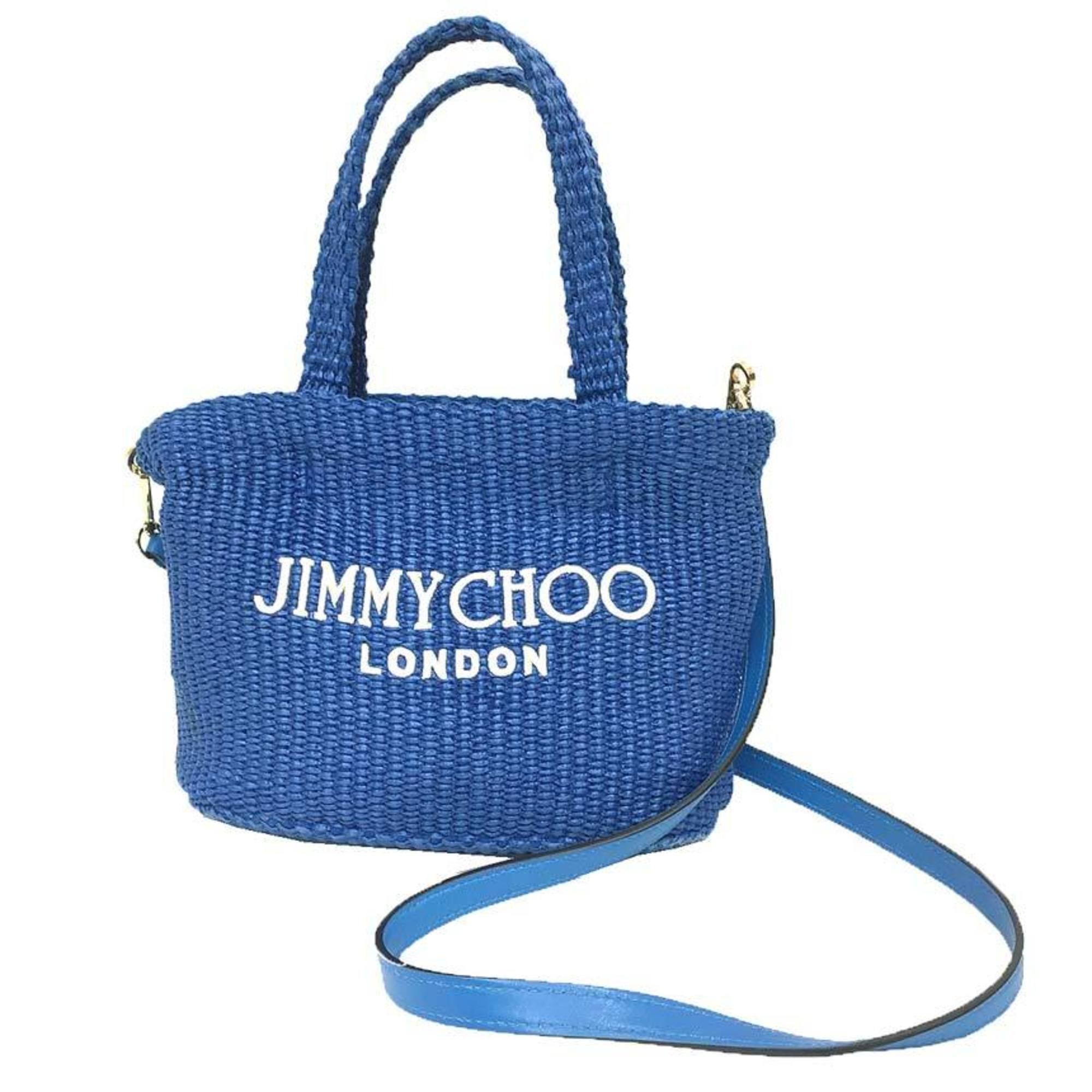 Jimmy Choo JIMMY CHOO BEACH TOTE E/W MINI JYN 25827494 Shoulder Bag in Sky and Latte Blue Raffia. Women's. Size ONE SIZE - 1 Thumbnail
