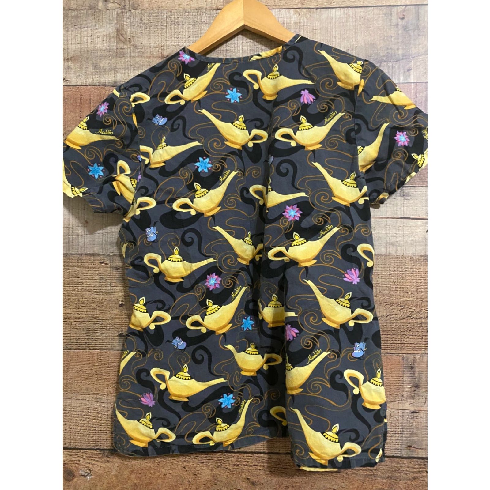 Disney Disney Scrub Top Women Small Disney's Aladdin Genie bottle Black Character Scrub Top Womens Size S / US 4 / IT 40 - 2 Thumbnail